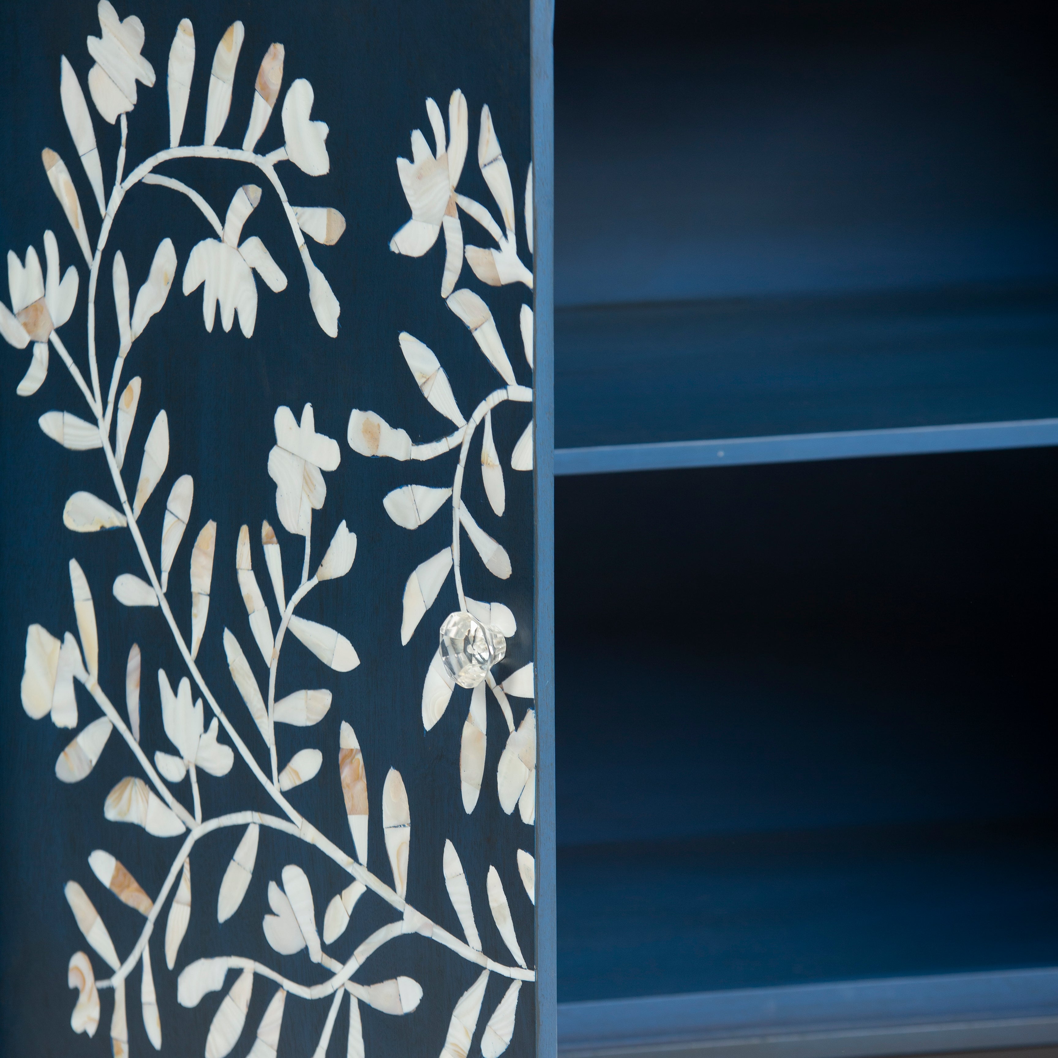 Mother of pearl inlay cabinet featuring intricate floral vine pattern in burgundy and white, handcrafted furniture piece