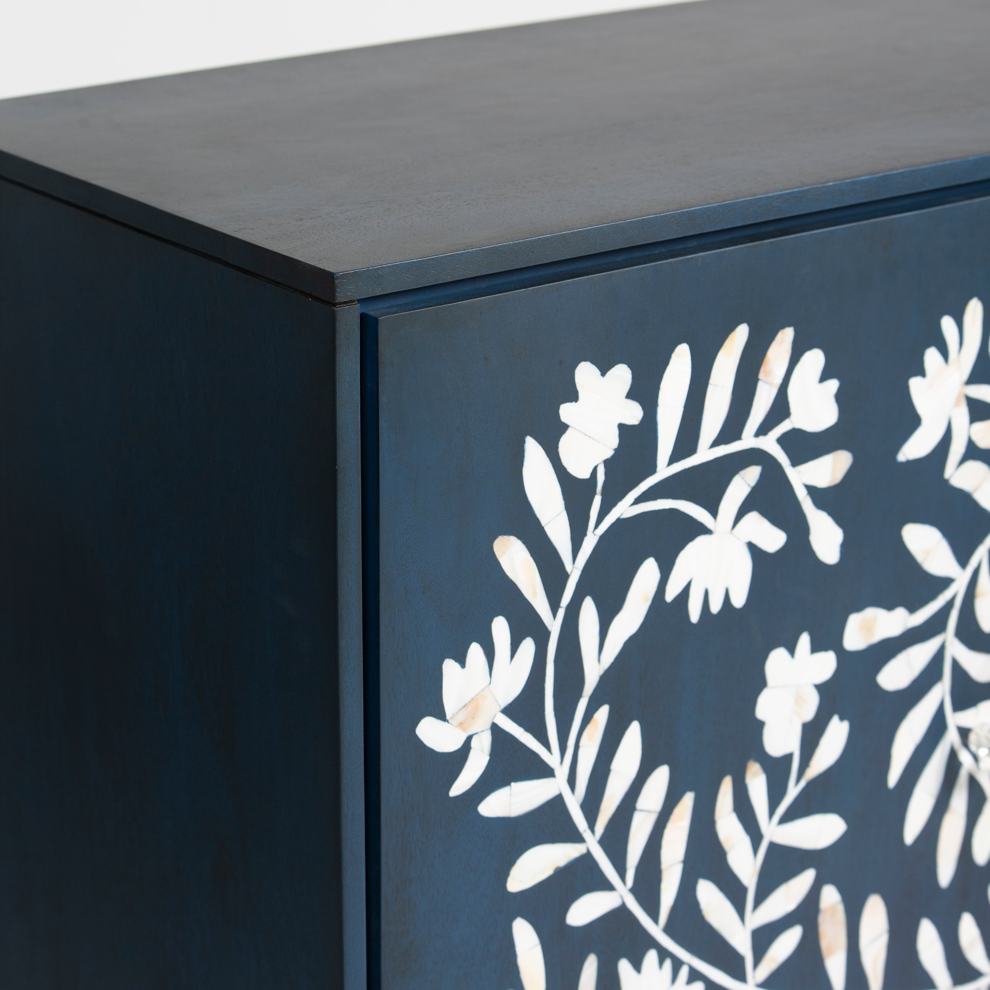 Mother of pearl inlay cabinet featuring intricate floral vine pattern in burgundy and white, handcrafted furniture piece