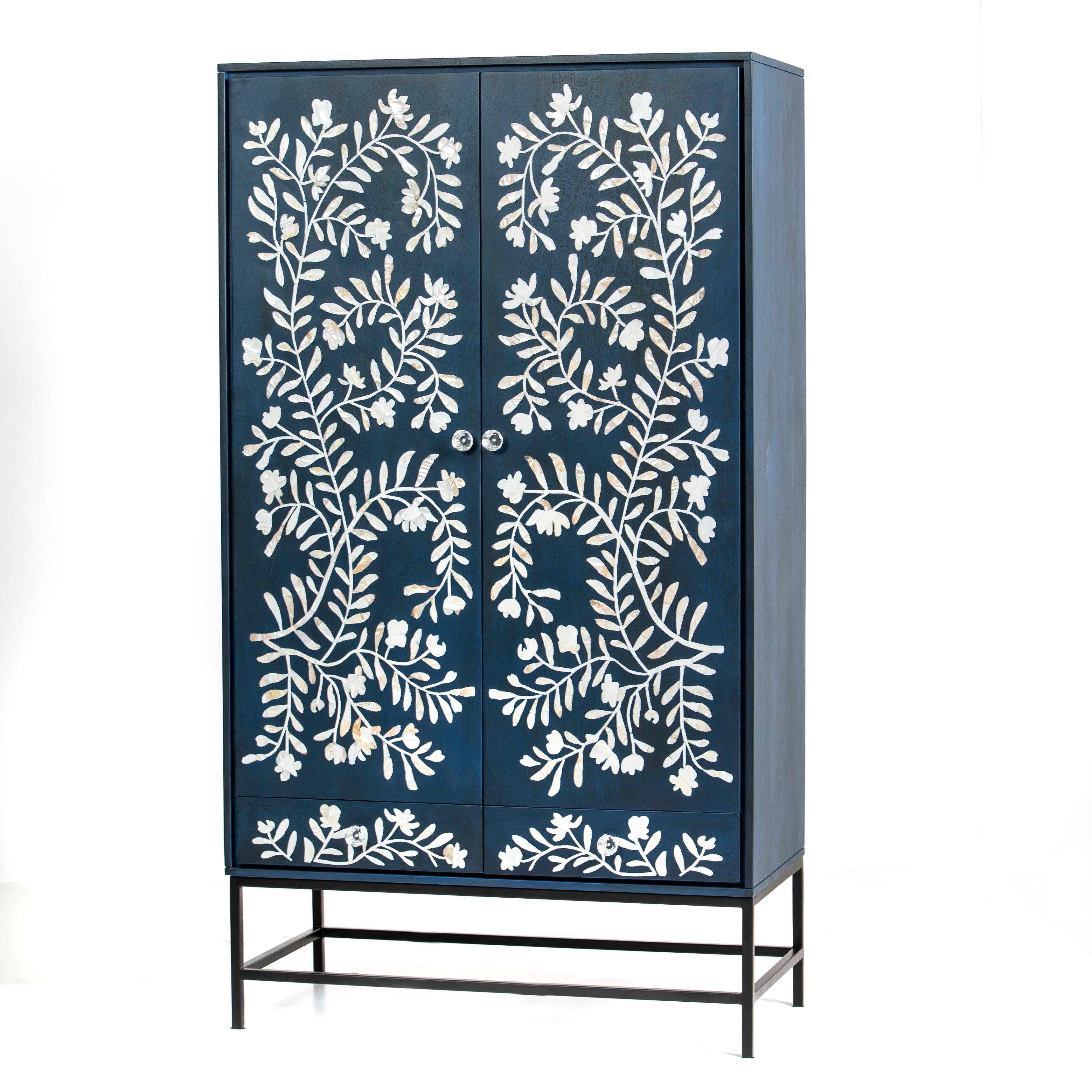 Mother of pearl inlay cabinet featuring intricate floral vine pattern in blue and white, handcrafted furniture piece
