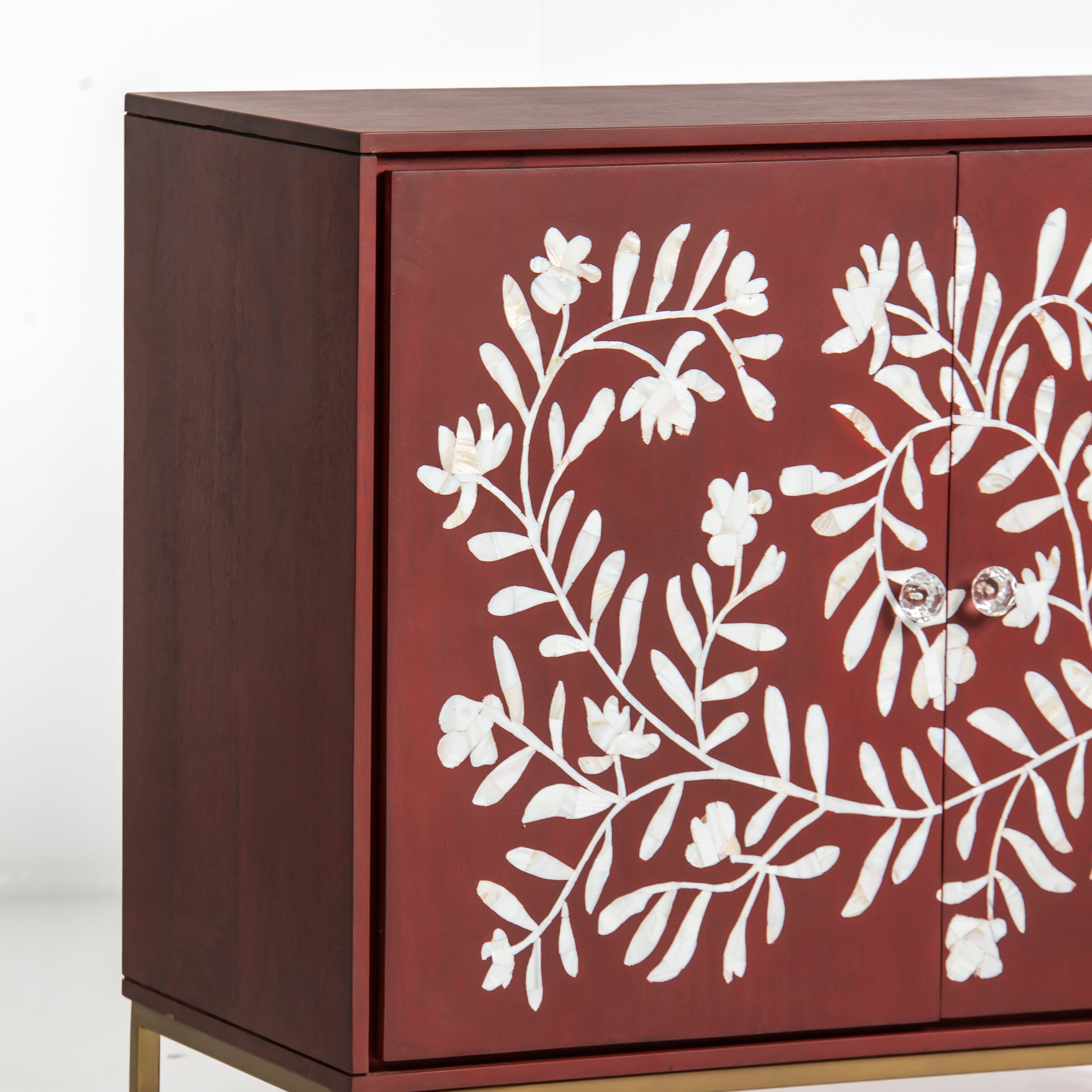 Mother of pearl inlay cabinet featuring intricate floral vine pattern in burgundy and white, handcrafted furniture piece