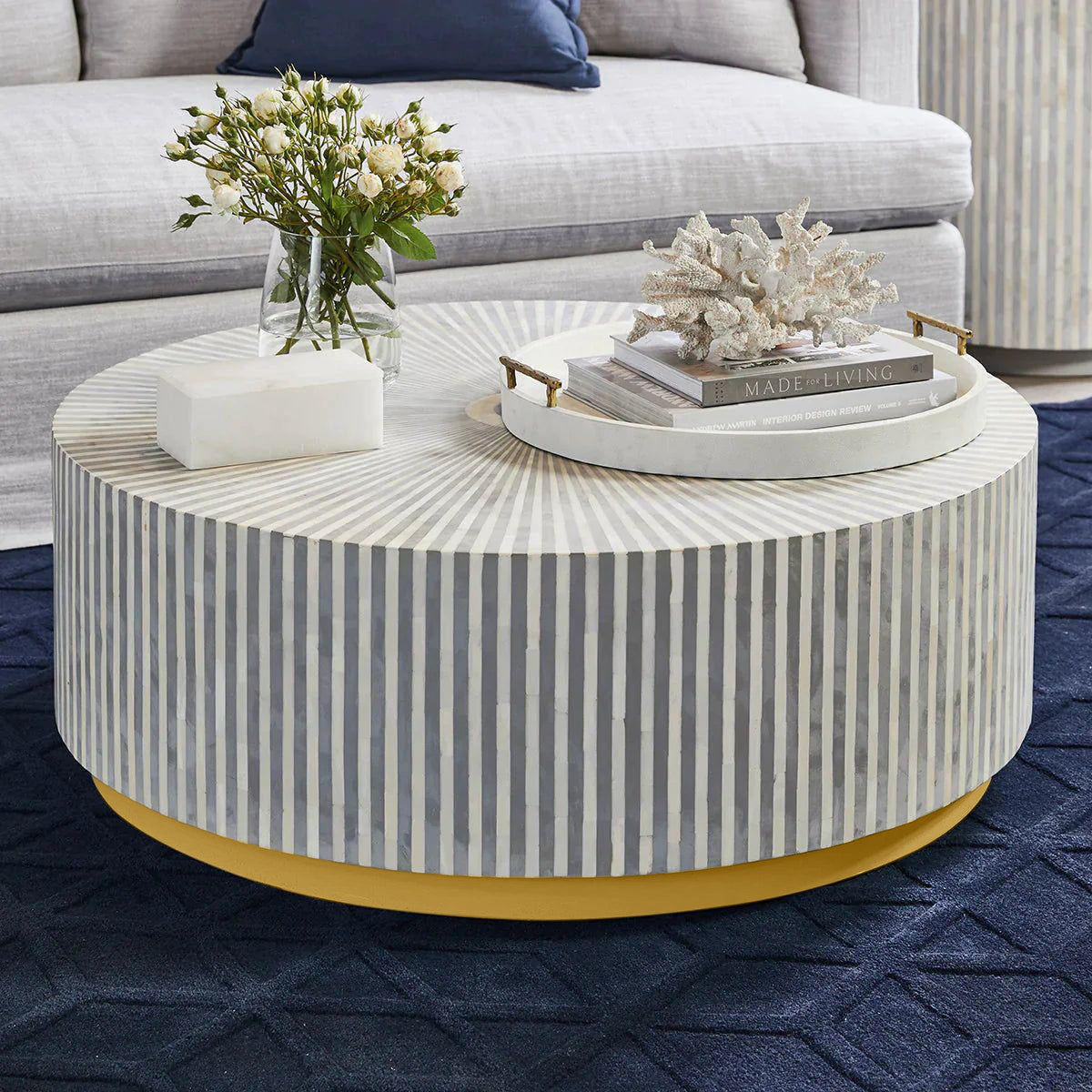 Manzil Coffee Table in grey bone inlay with golden base, handcrafted with bold striped design, size 100x100x45 cm.