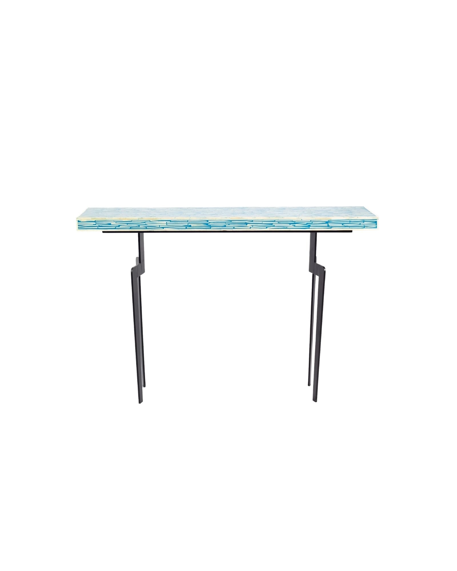 Modern console table with a blue and white patterned top on a white background.
