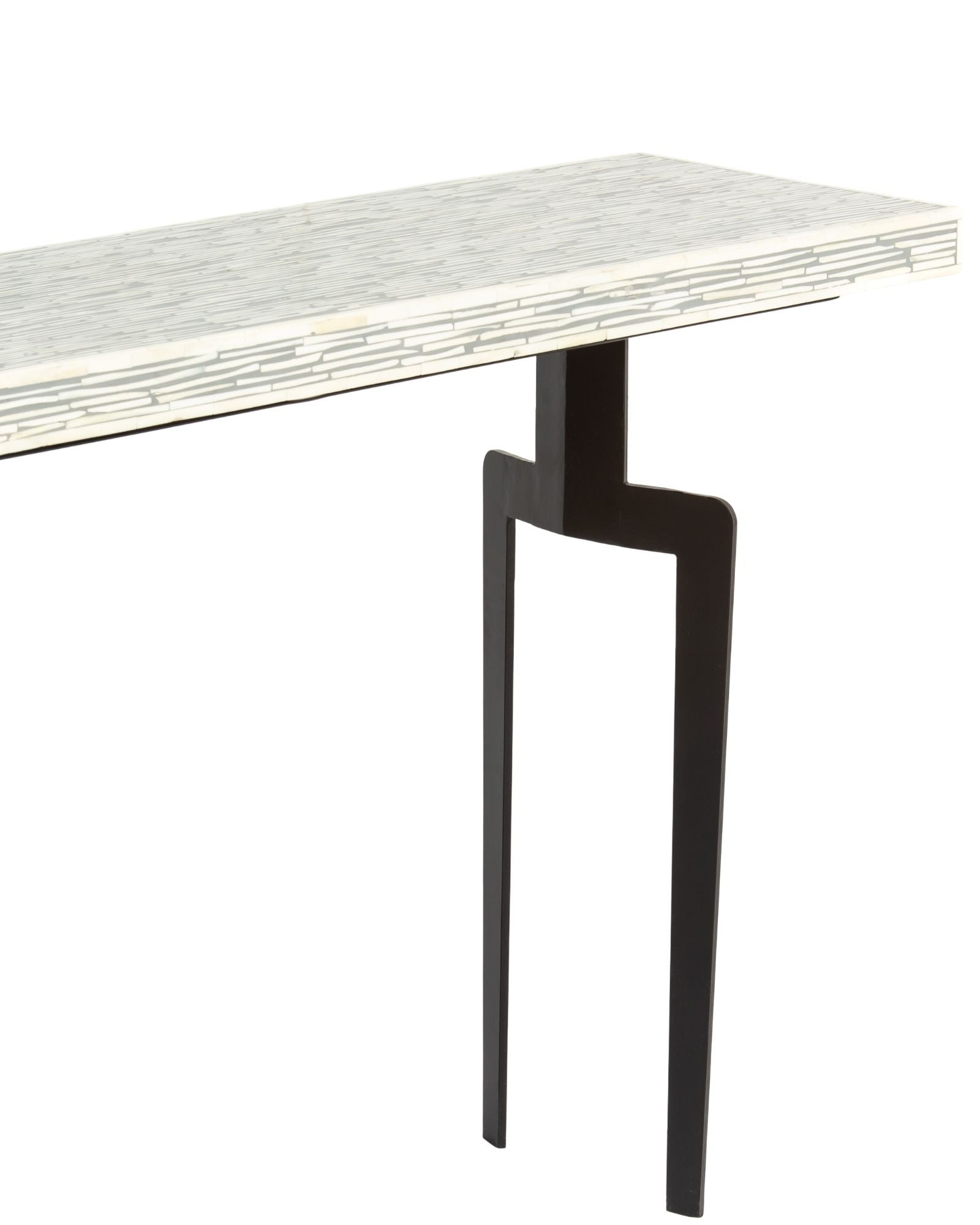 Table with bone inlay top and black legs on a white background