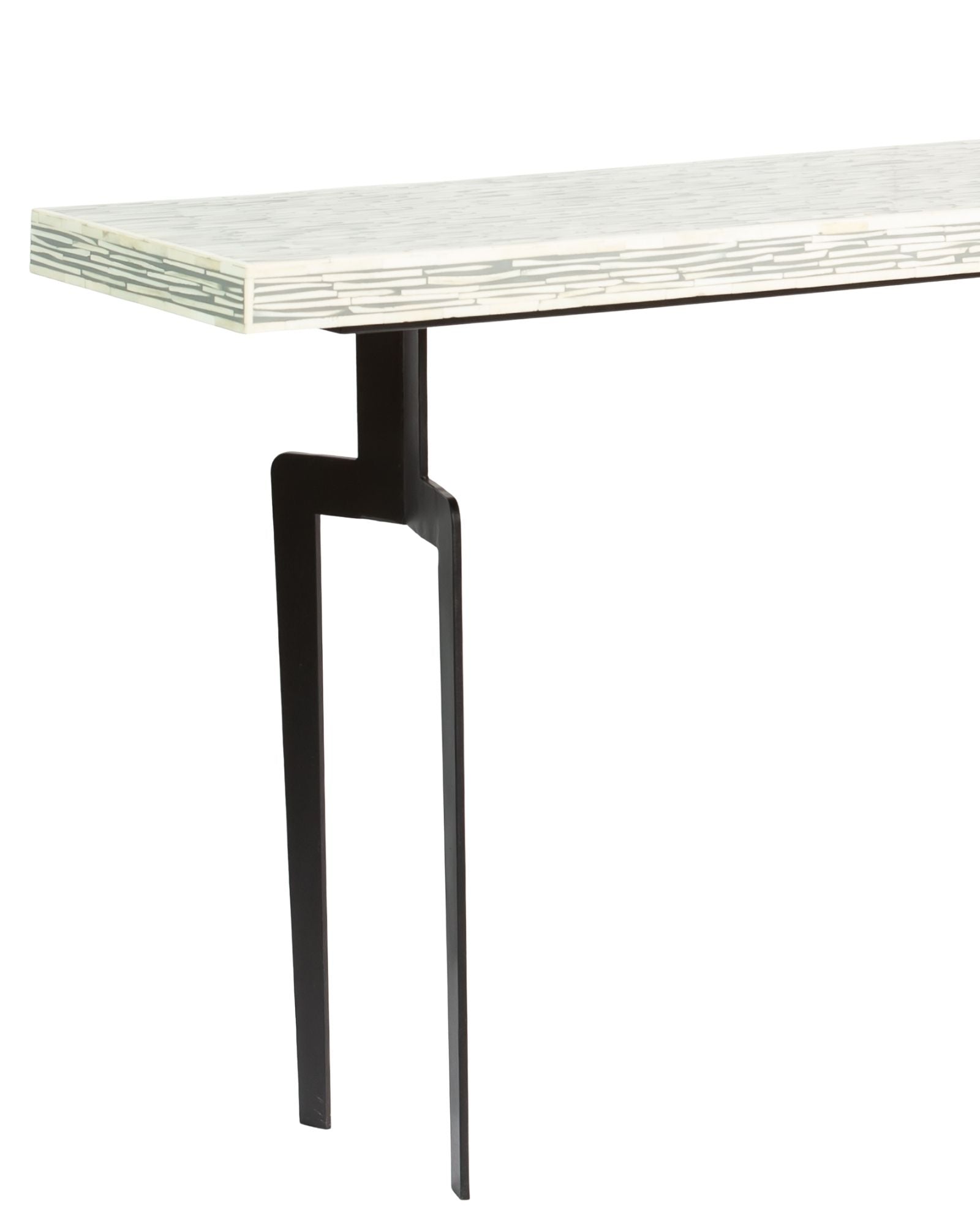 Table with bone inlay top and black legs on a white background