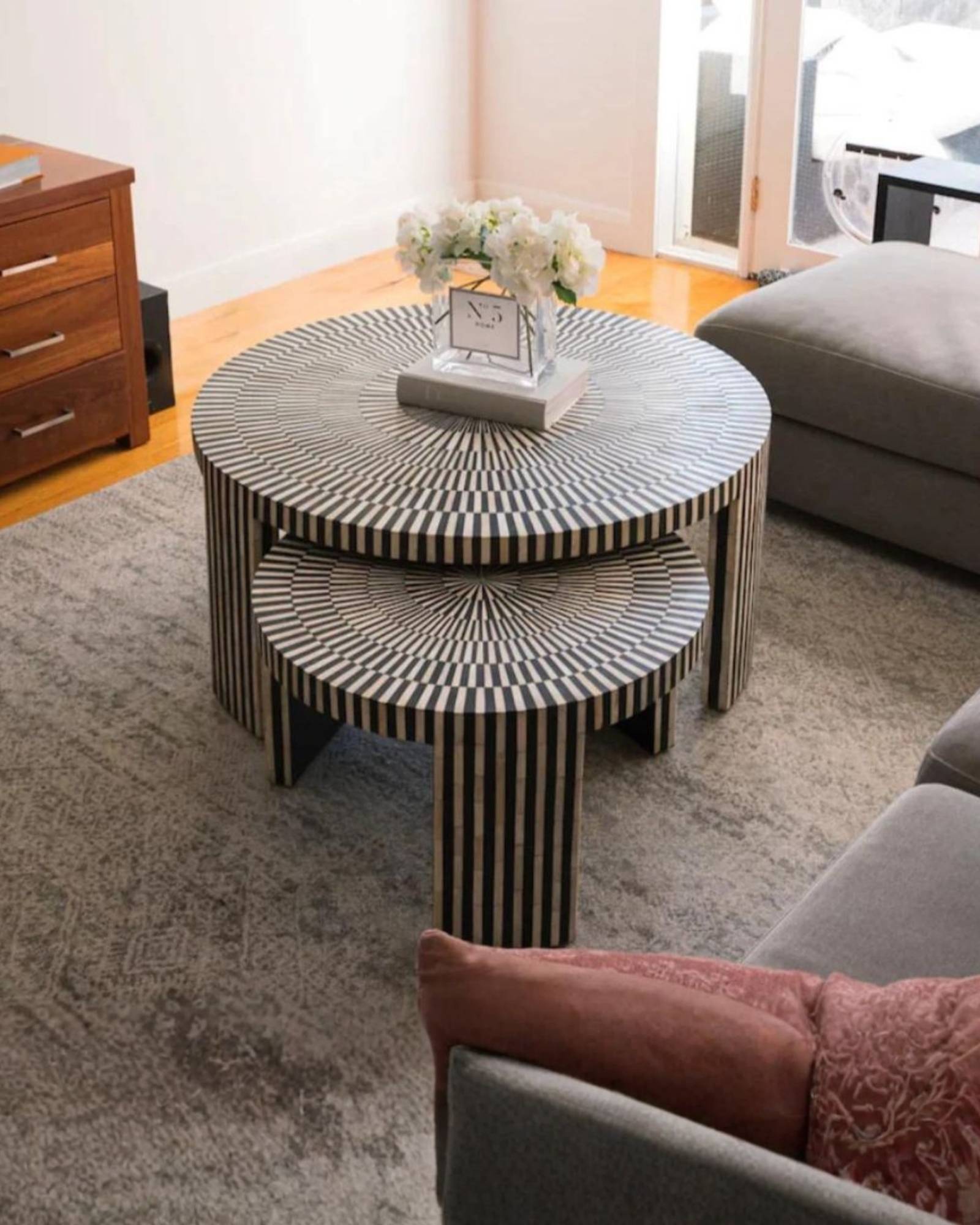 Discover the Saphed Nesting Coffee Table, handcrafted in black and white bone inlay. A striking sunburst design perfect for modern and luxury interiors.
