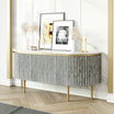 Black bone inlay sideboard with white marble top and brass legs, handcrafted with vertical striping and curved silhouette, luxury interior furniture.
