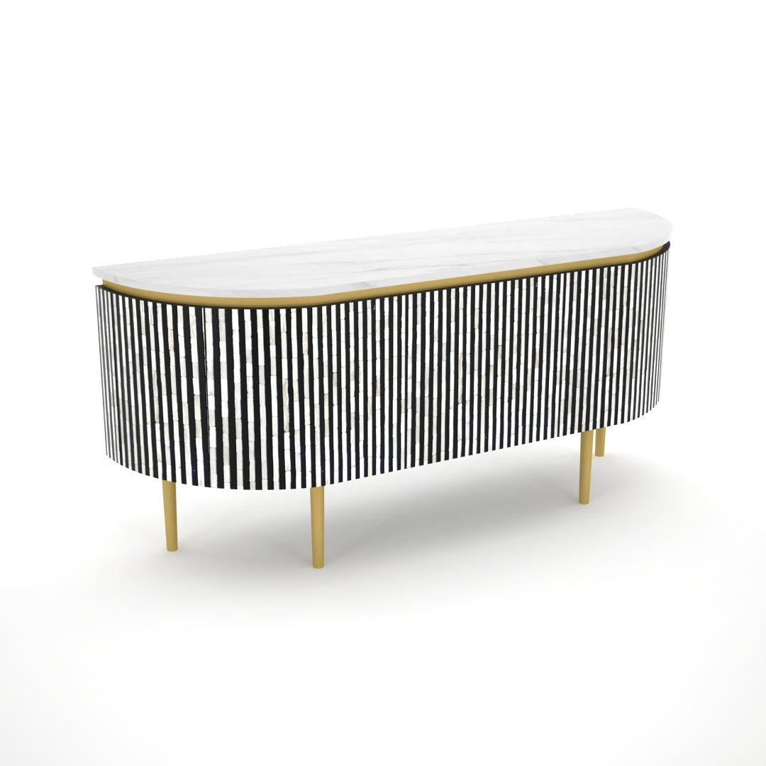 Black bone inlay sideboard with white marble top and brass legs, handcrafted with vertical striping and curved silhouette, luxury interior furniture.