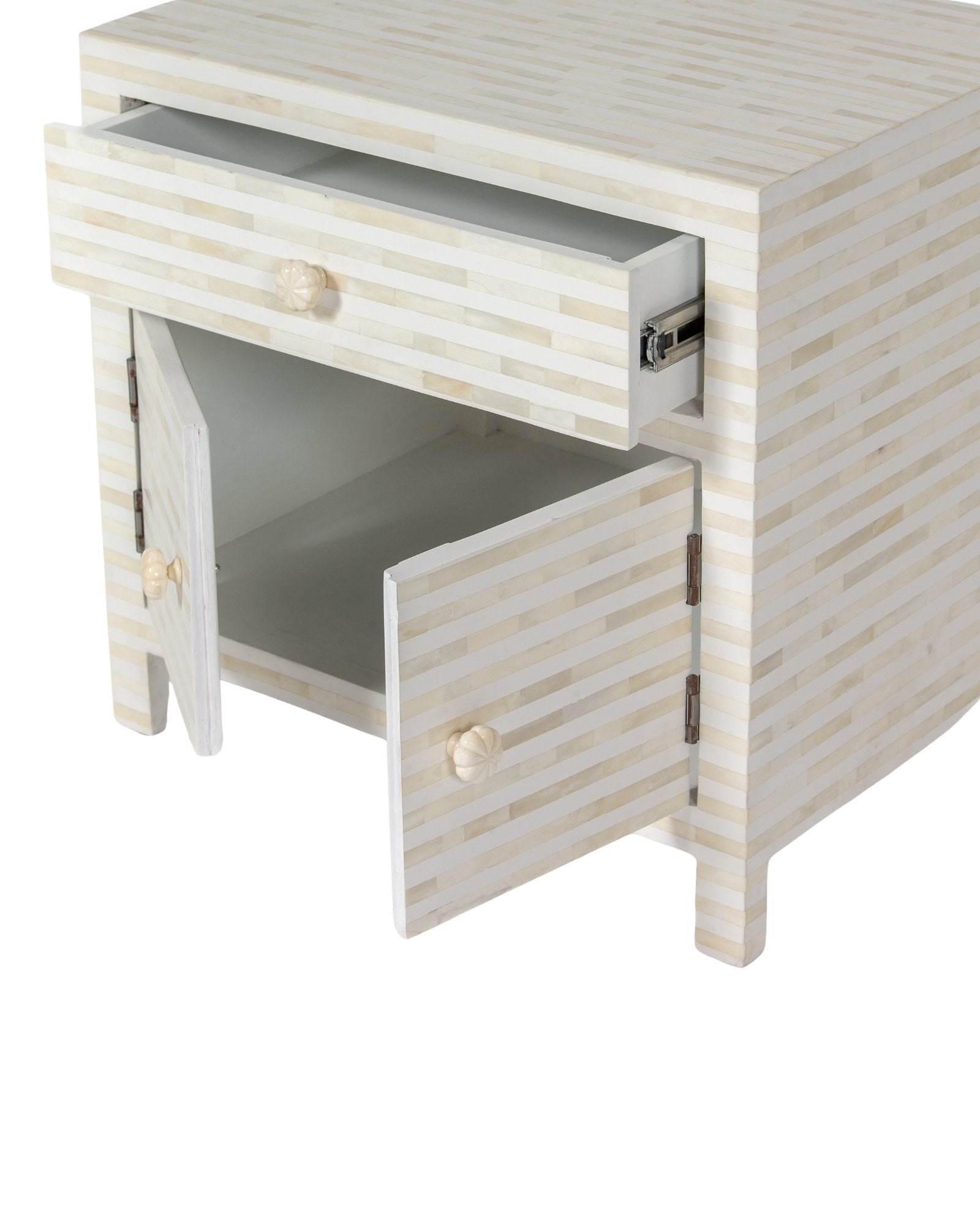 The Saphed Side Drawer features white bone inlay with cabinet doors and a drawer. A graceful accent for luxury interiors.
