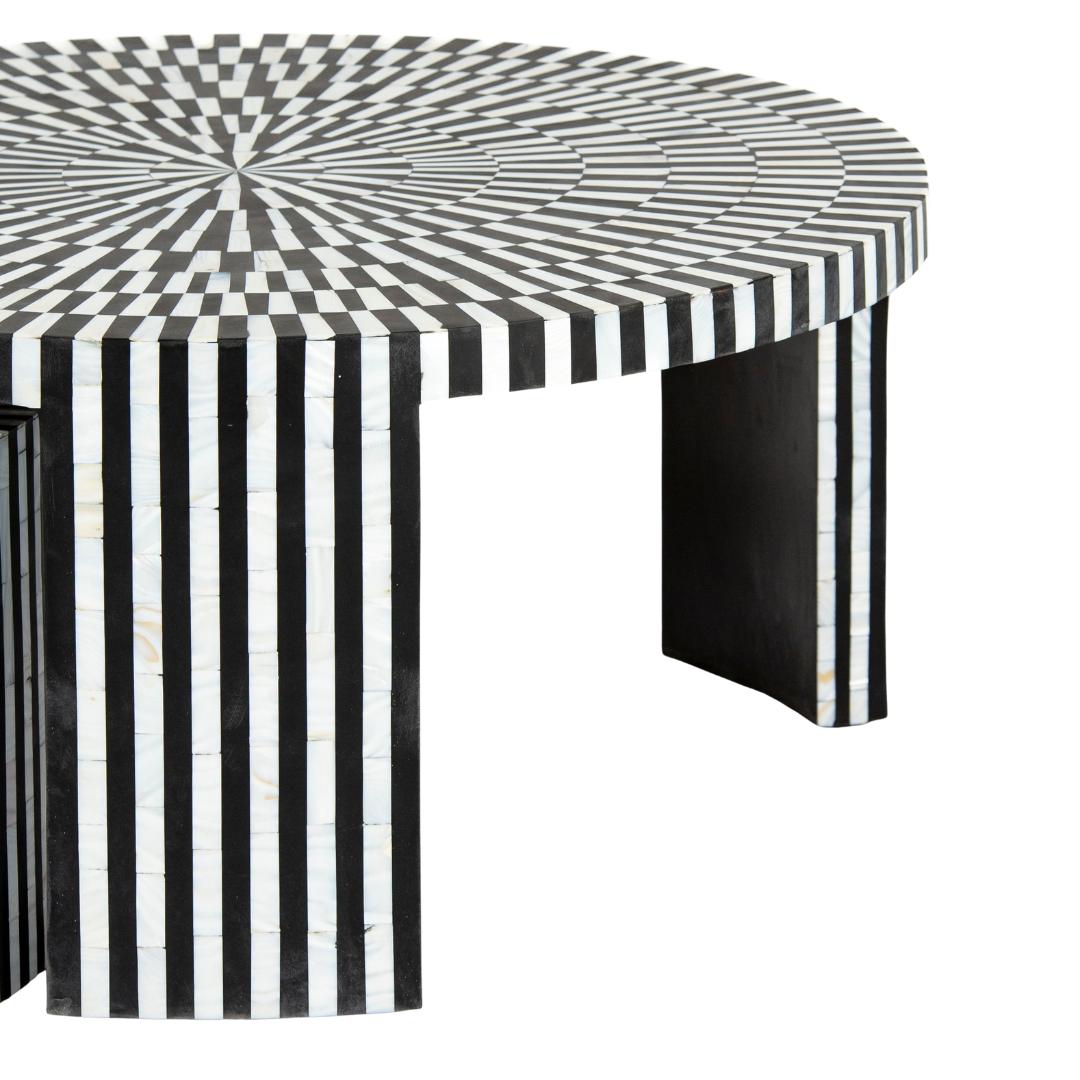 Black and white geometric mother of pearl inlay coffee table with radial top and striped base, handcrafted by Tabeer Homes.