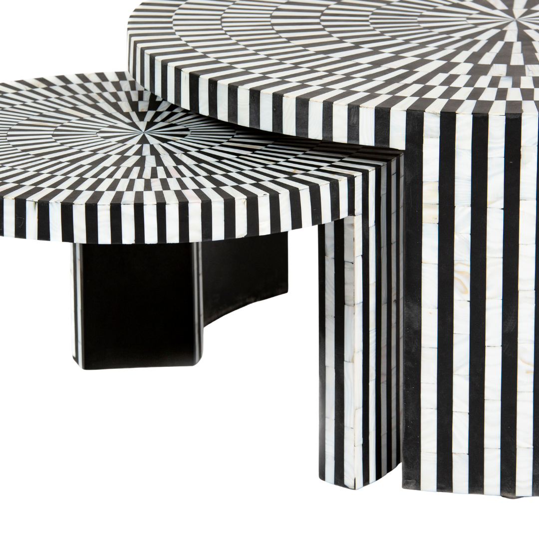 Black and white geometric mother of pearl inlay coffee table with radial top and striped base, handcrafted by Tabeer Homes.