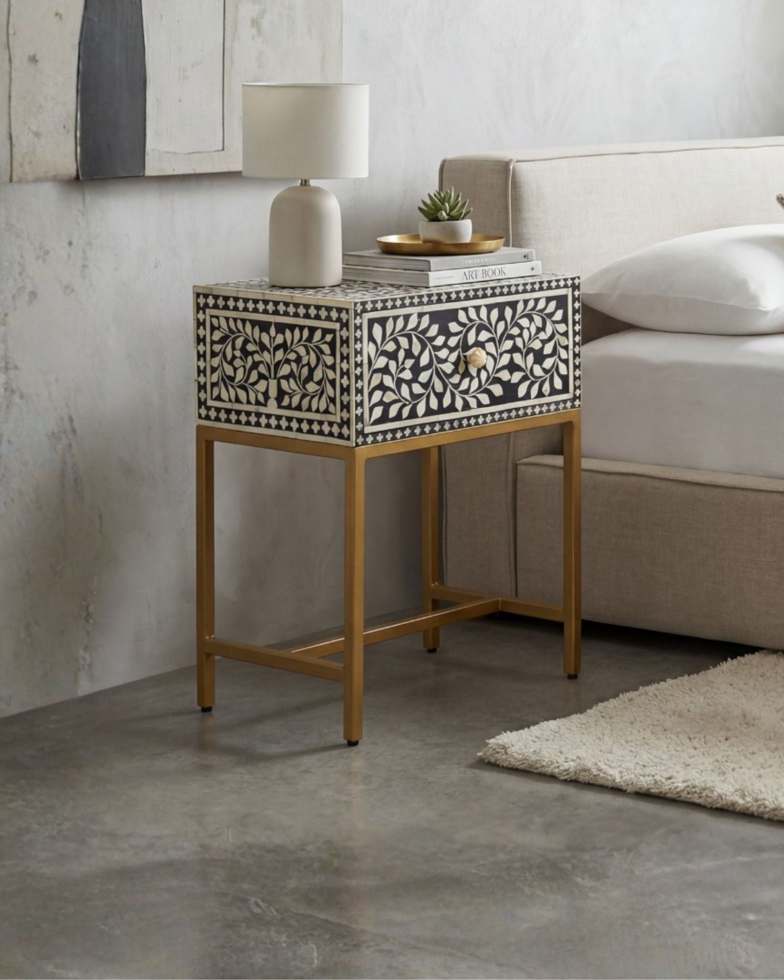 Bone inlay side drawer featuring floral vine pattern in black and white with metal base, handcrafted furniture piece
