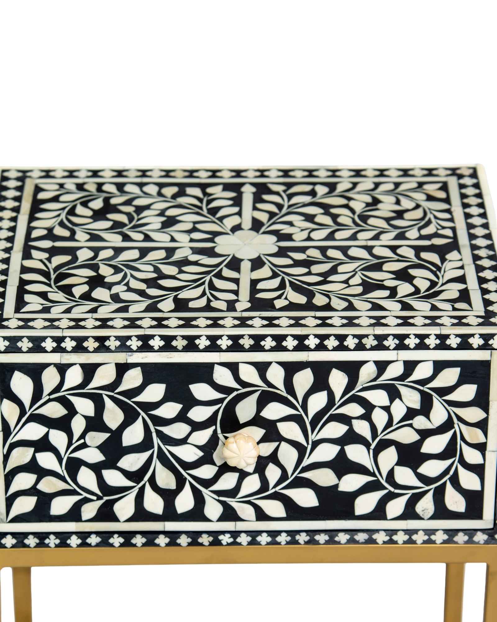 Bone inlay side drawer featuring floral vine pattern in black and white with metal base, handcrafted furniture piece