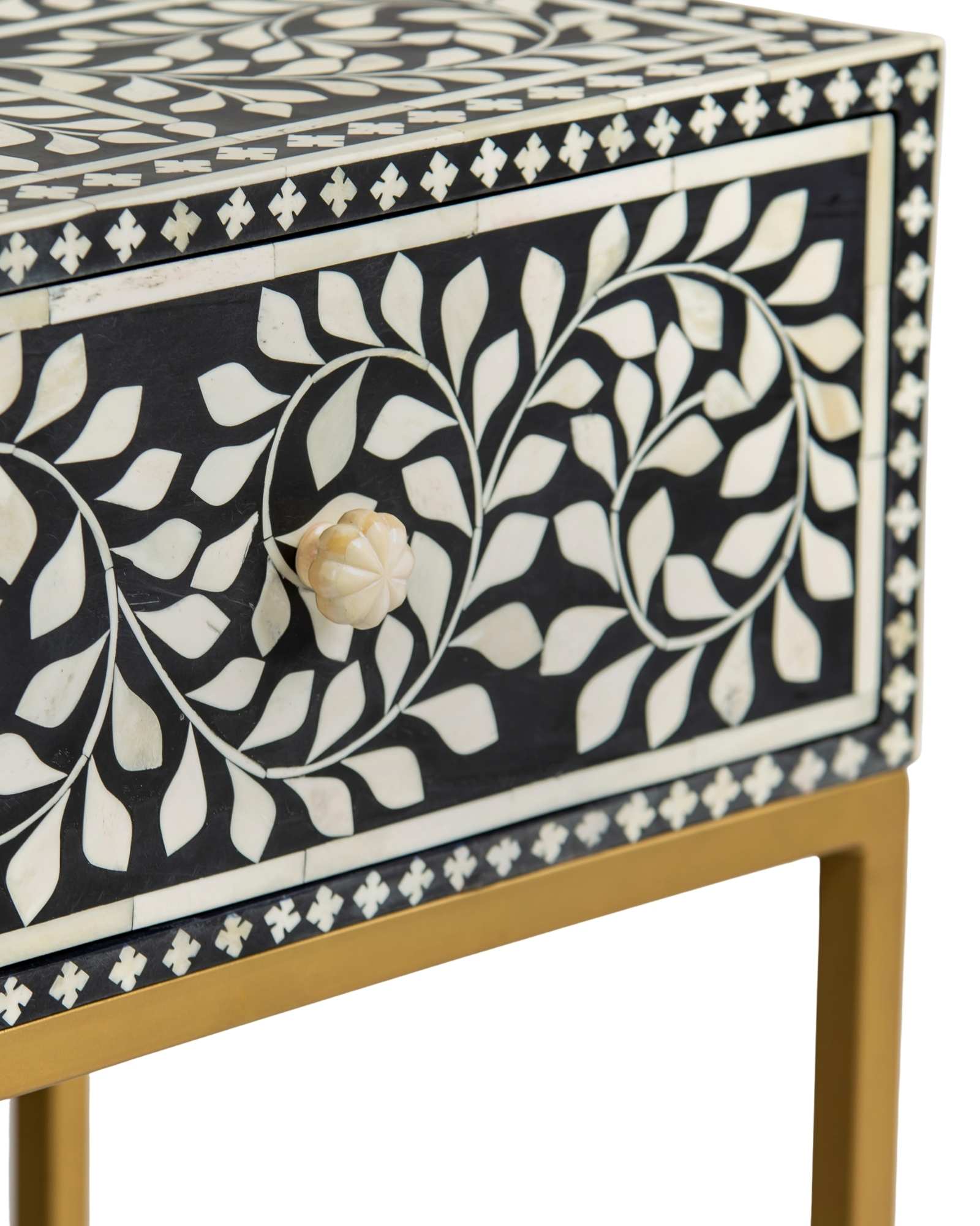 Bone inlay side drawer featuring floral vine pattern in black and white with metal base, handcrafted furniture piece