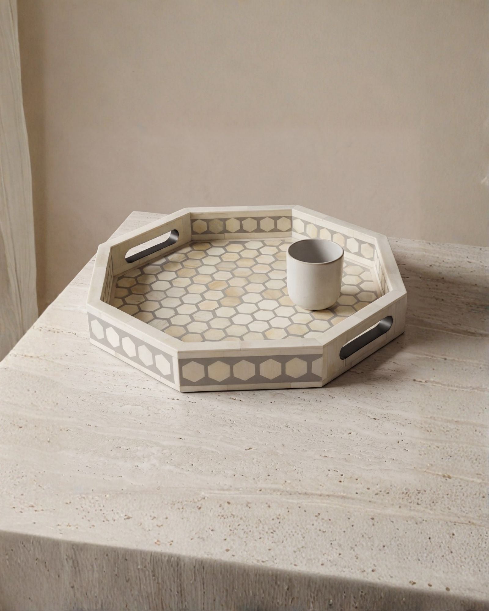 Grey bone inlay tray with hexagonal pattern, handcrafted decorative serving tray.
