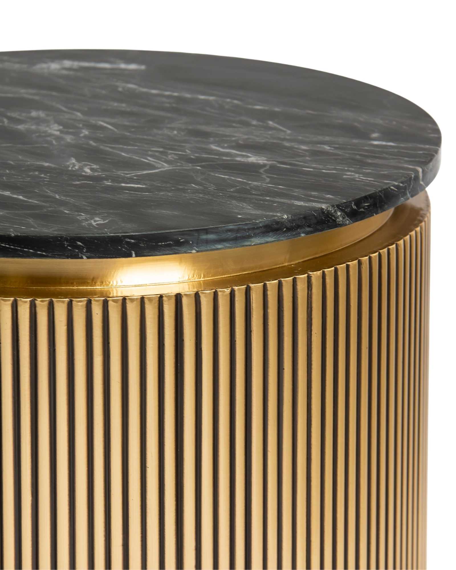 Brass clad side table featuring fluted texture with black marble top, handcrafted furniture piece.