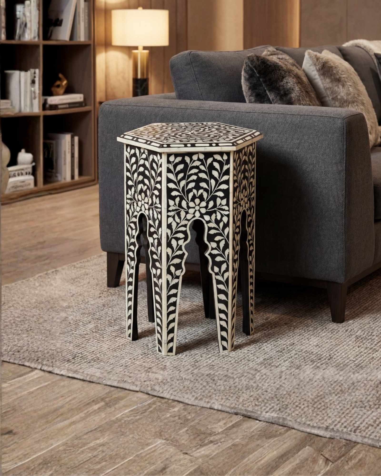 Handcrafted Yasmine side table in black bone inlay with a hexagonal form and arched legs, perfect as a refined accent piece.