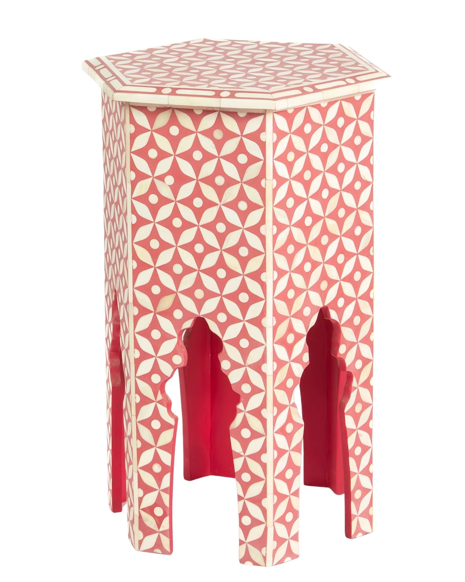 Handcrafted Yasmine side table featuring pink bone inlay with a hexagonal silhouette, geometric detailing, and arched legs.