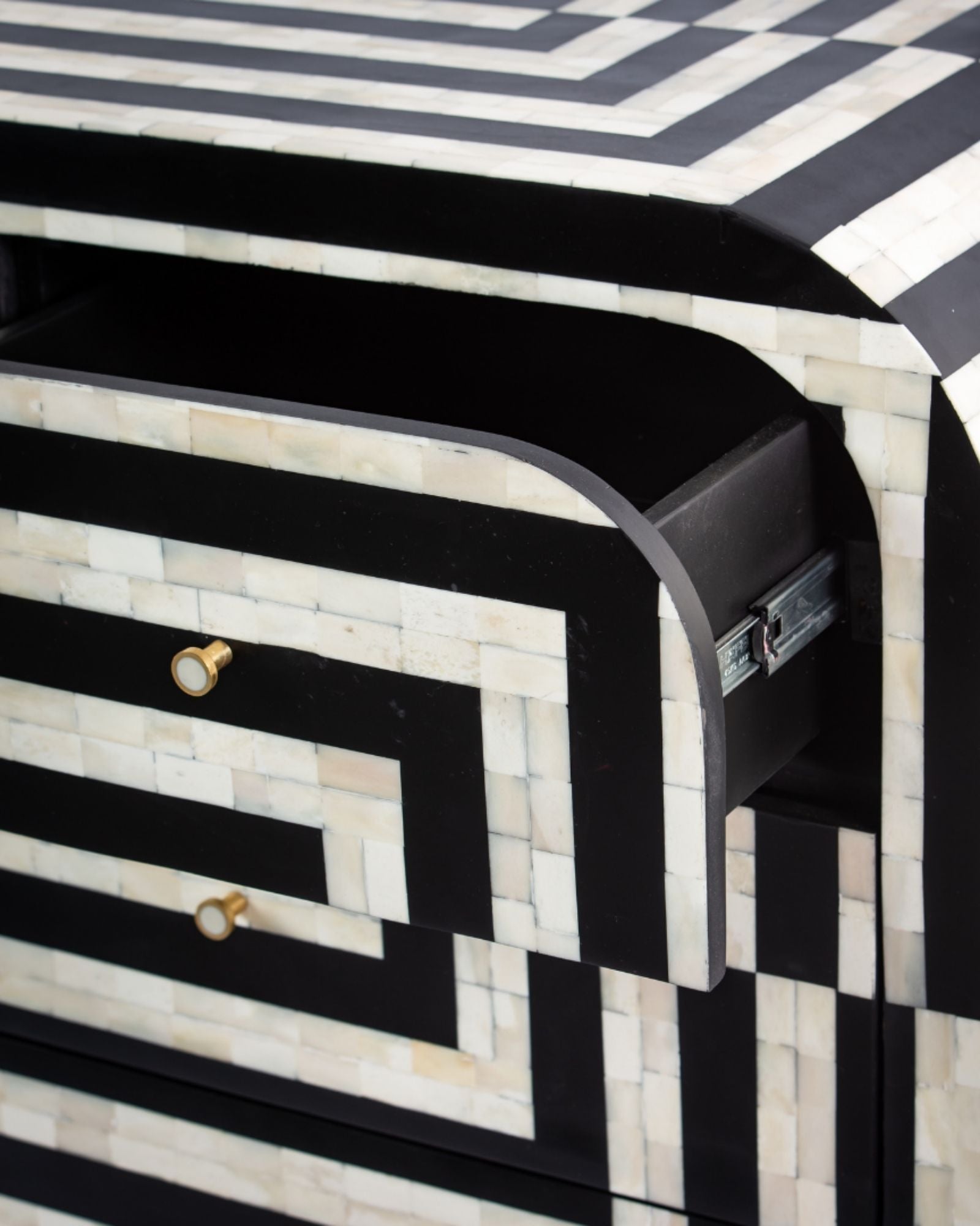 Zuri Striped Chest of Drawers in Black and white bone inlay by Tabeer Homes, featuring 7 drawers.