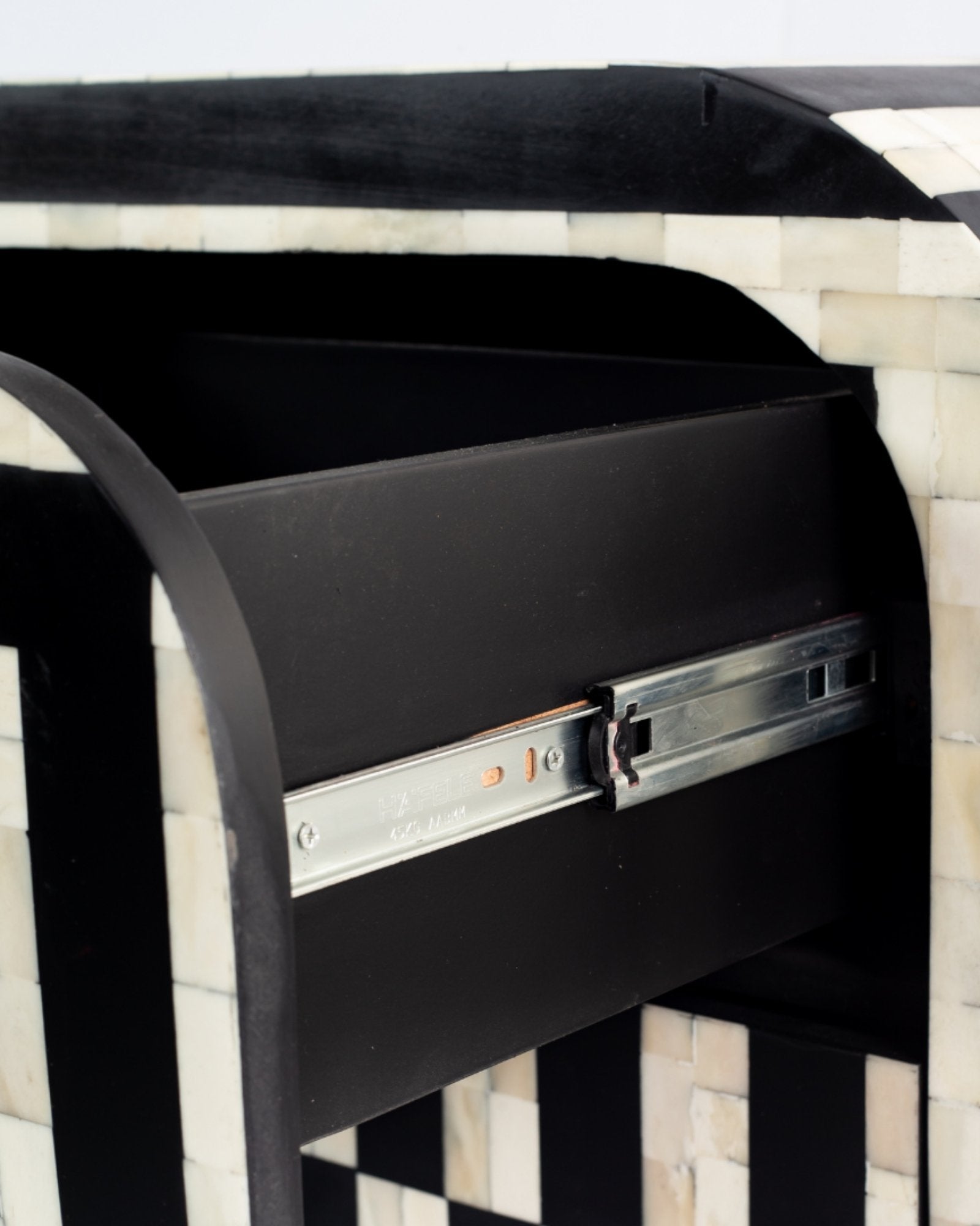 Zuri Striped Chest of Drawers in Black and white bone inlay by Tabeer Homes, featuring 7 drawers.