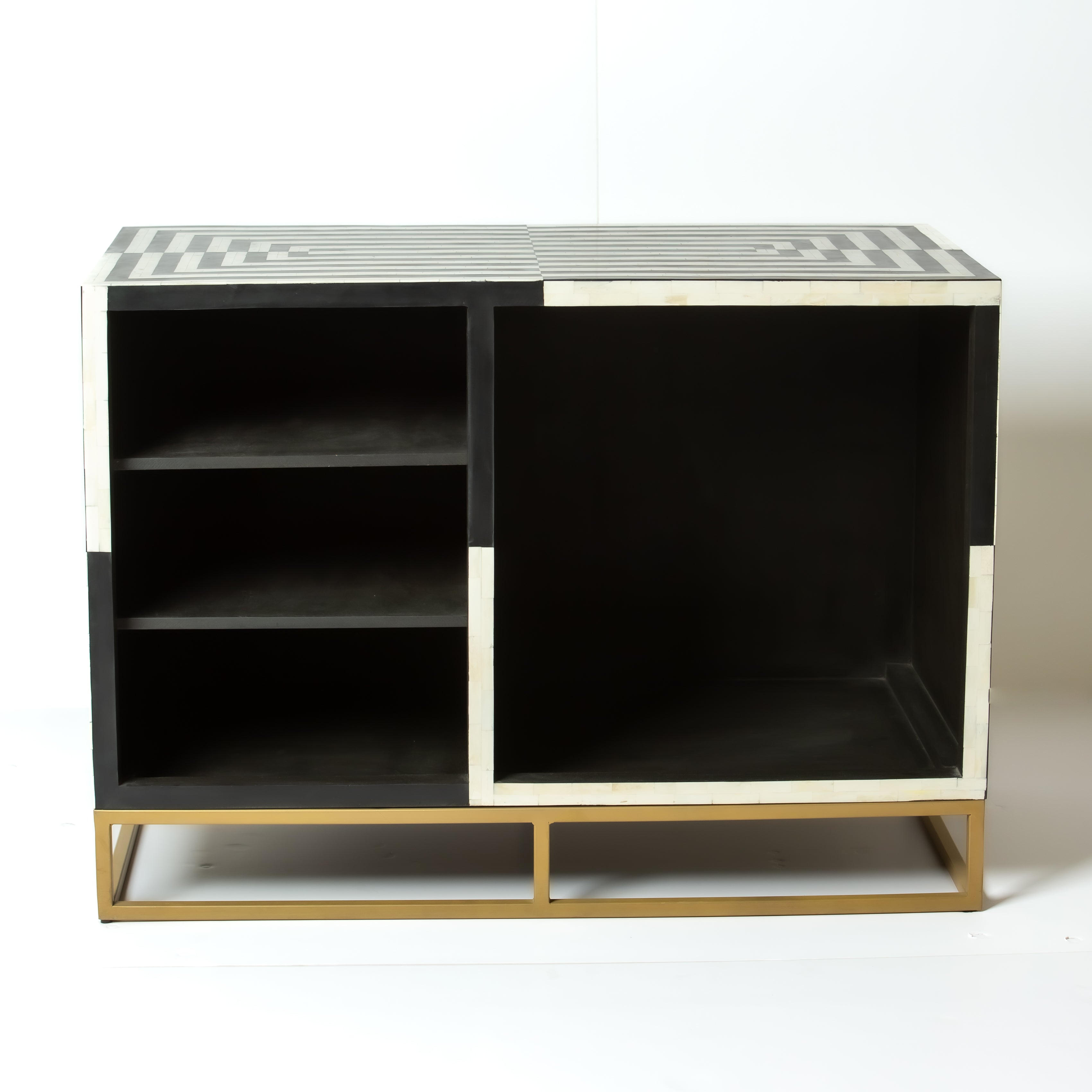 Black bone inlay bar cabinet with bold geometric front and open back storage, handmade with brass base and striking design.
