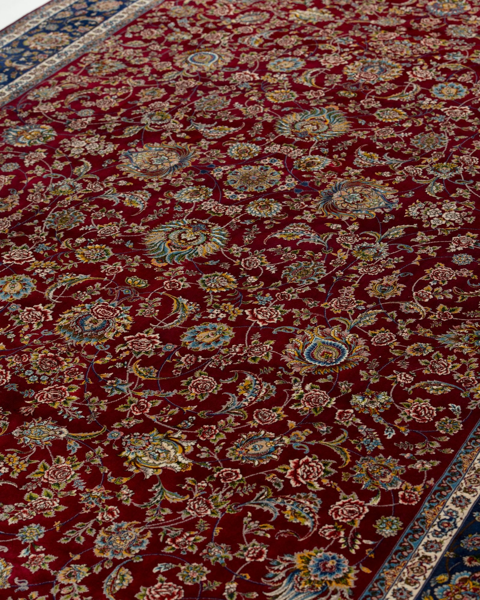 Alessia silk carpet floral motif close-up in ruby red, 200 x 300 cm - Tabeer Homes Dubai