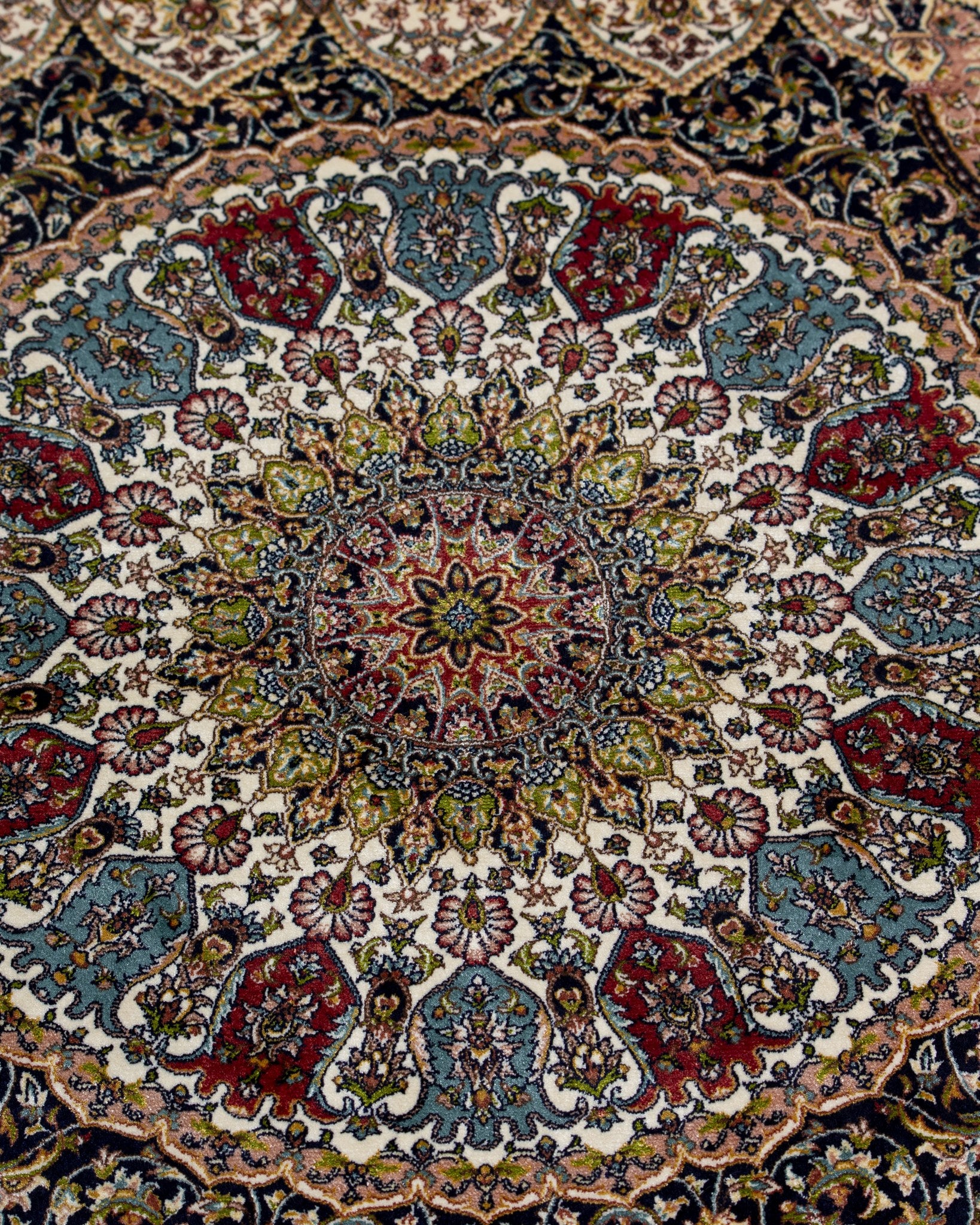 Detail of the Anahita silk rug medallion floral work