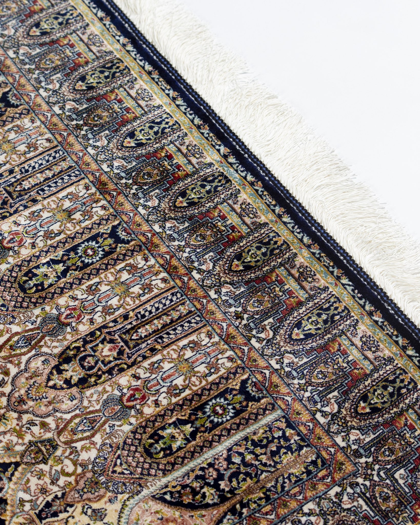 Anahita silk rug medallion detail in warm neutral tones