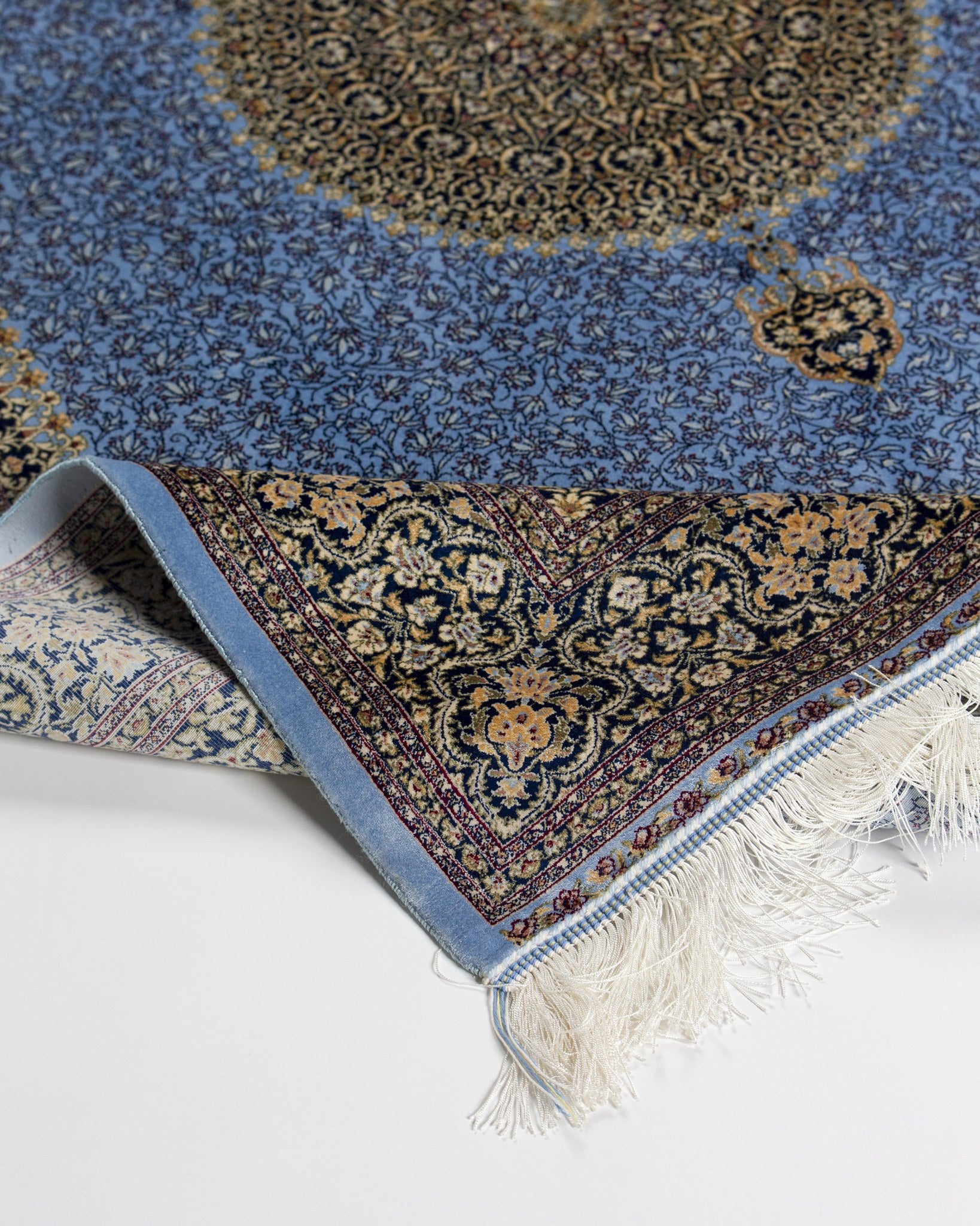 Corner detail of the Aseman silk rug