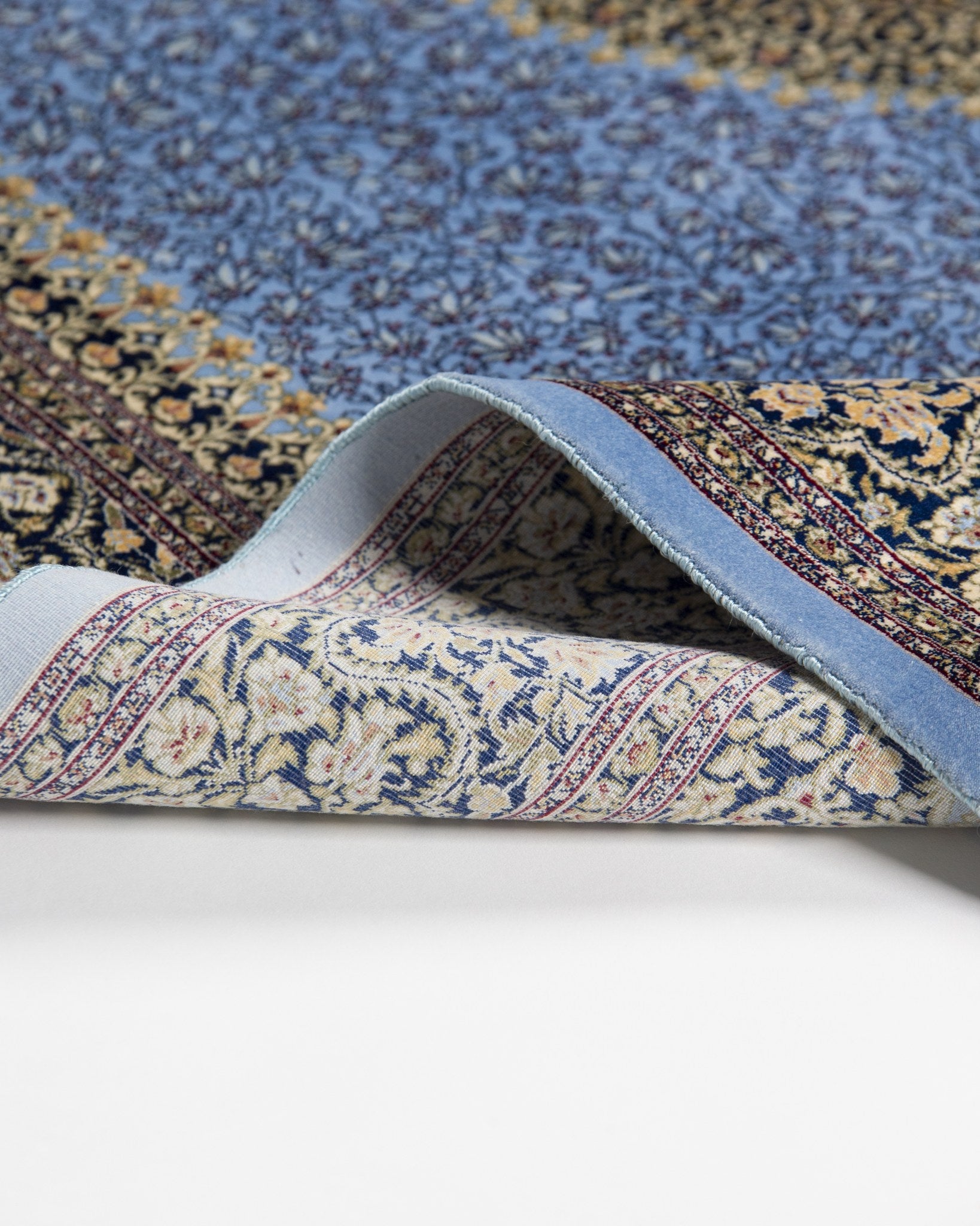 Reverse of the Aseman silk rug showing its fine weave