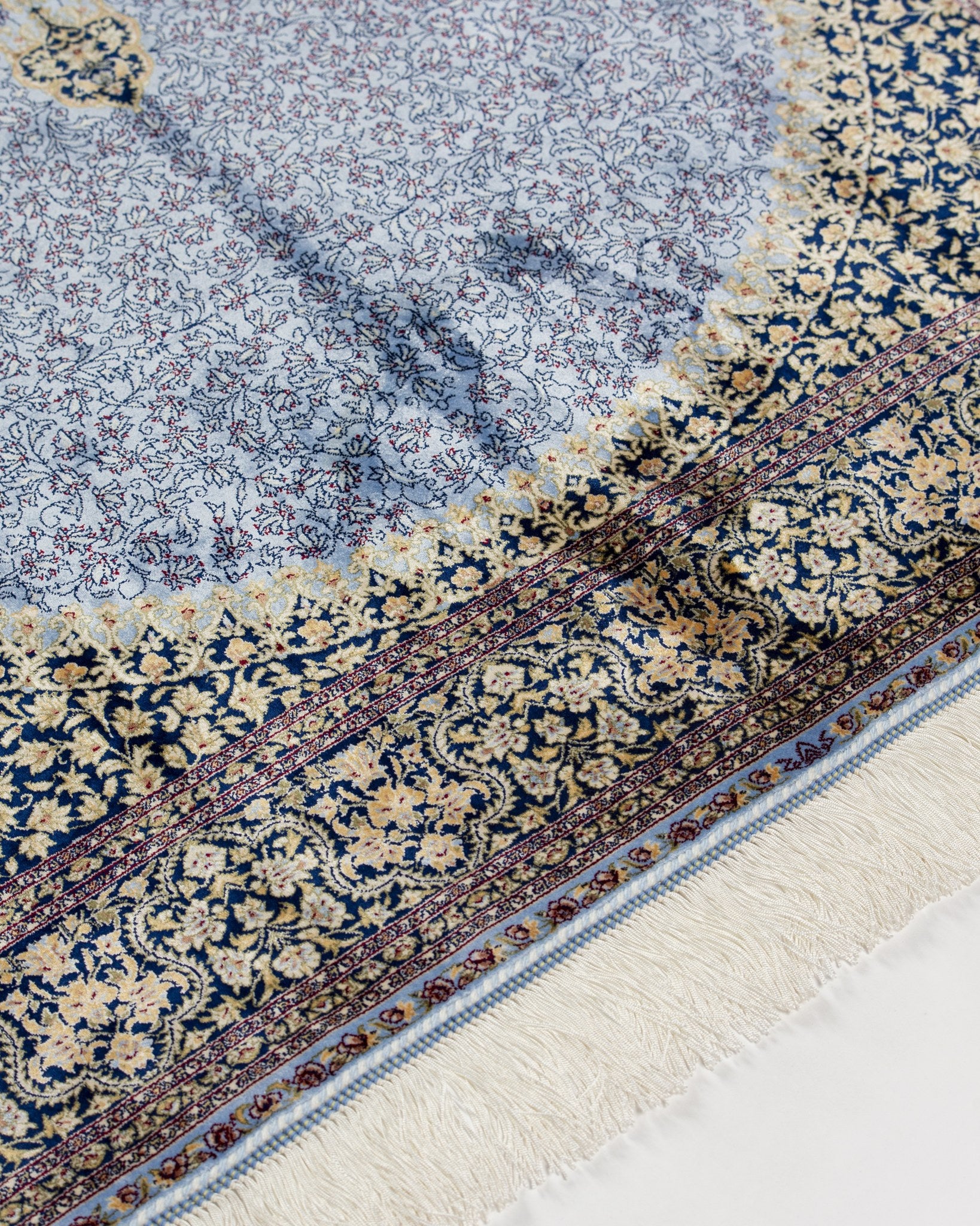 Aseman blue silk rug corner detail