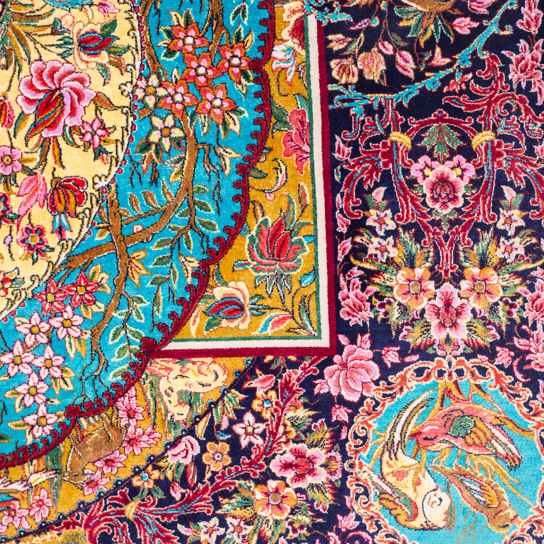 Azmin Silk Rug featuring navy base with gold vines, teal medallions, and pink floral detailing, 150x100 cm.