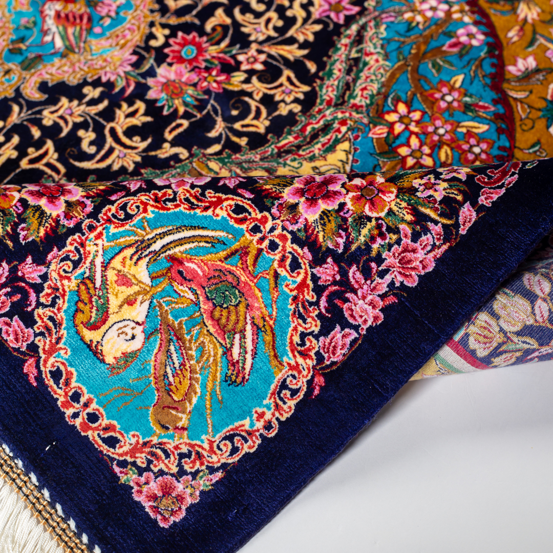 Azmin Silk Rug featuring navy base with gold vines, teal medallions, and pink floral detailing, 150x100 cm.