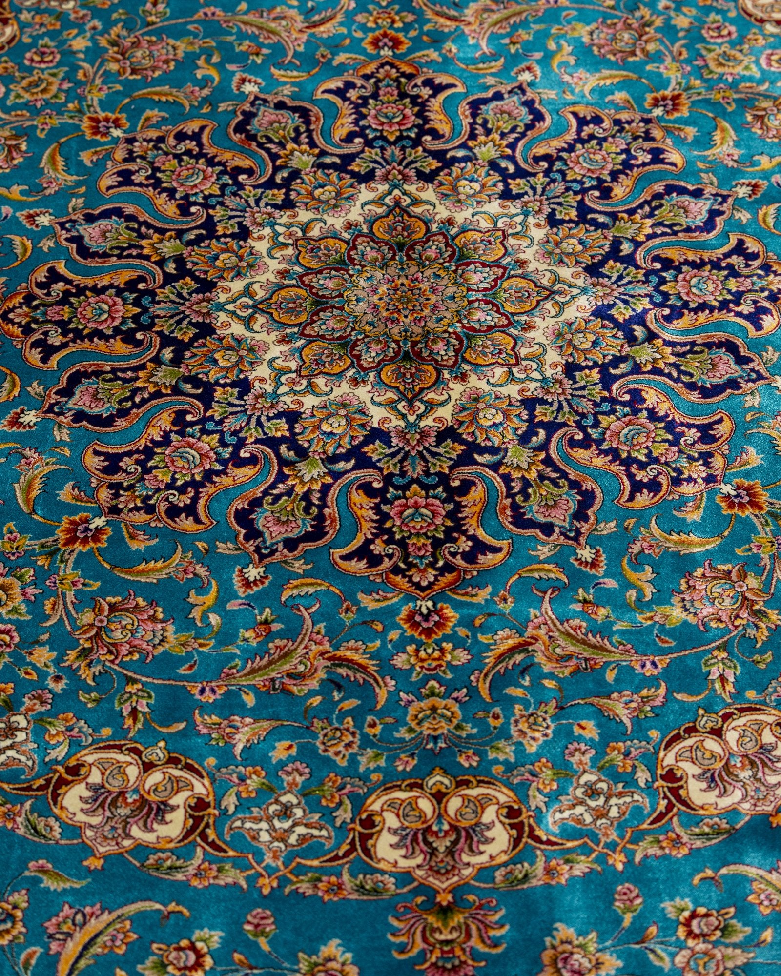 reverse showing the fine silk weave on the Marina turquoise silk rug