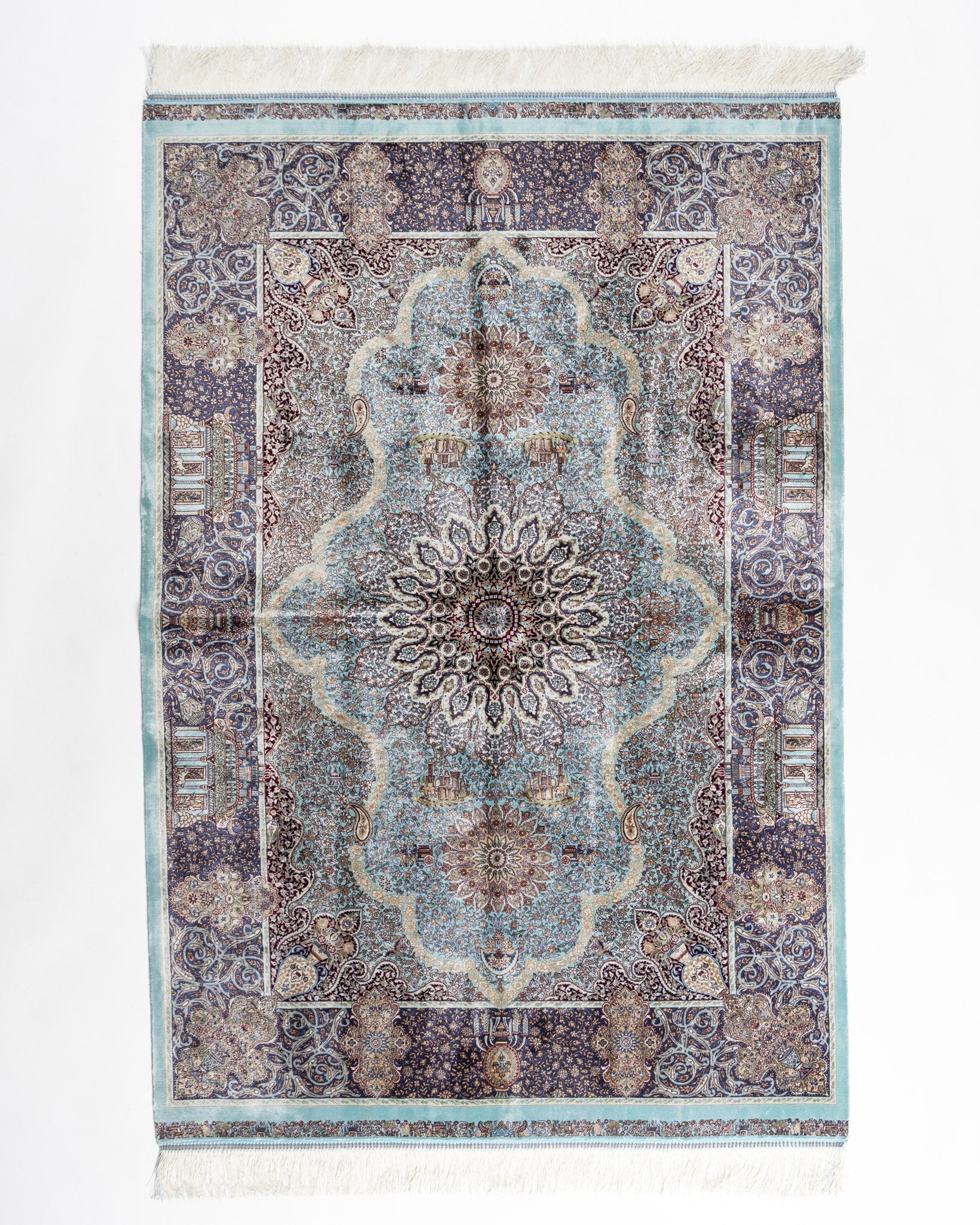 Banafsheh teal silk rug 150 x 100 cms with a floral medallion