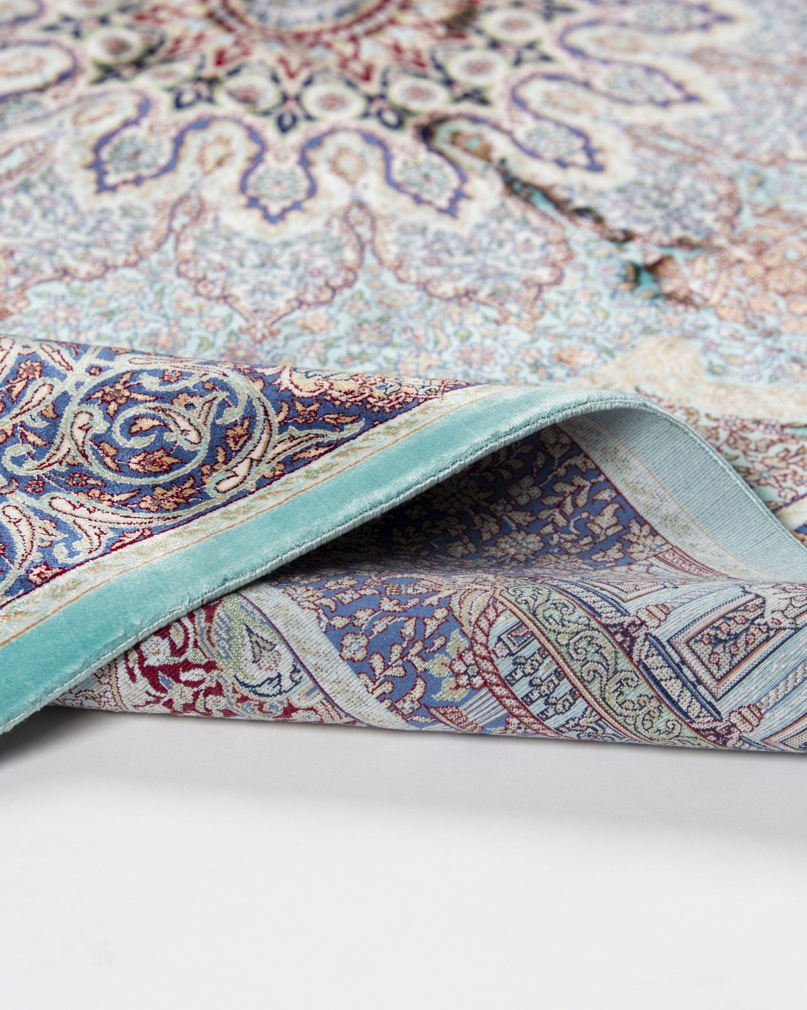 Reverse of the Banafsheh silk rug showing its fine weave