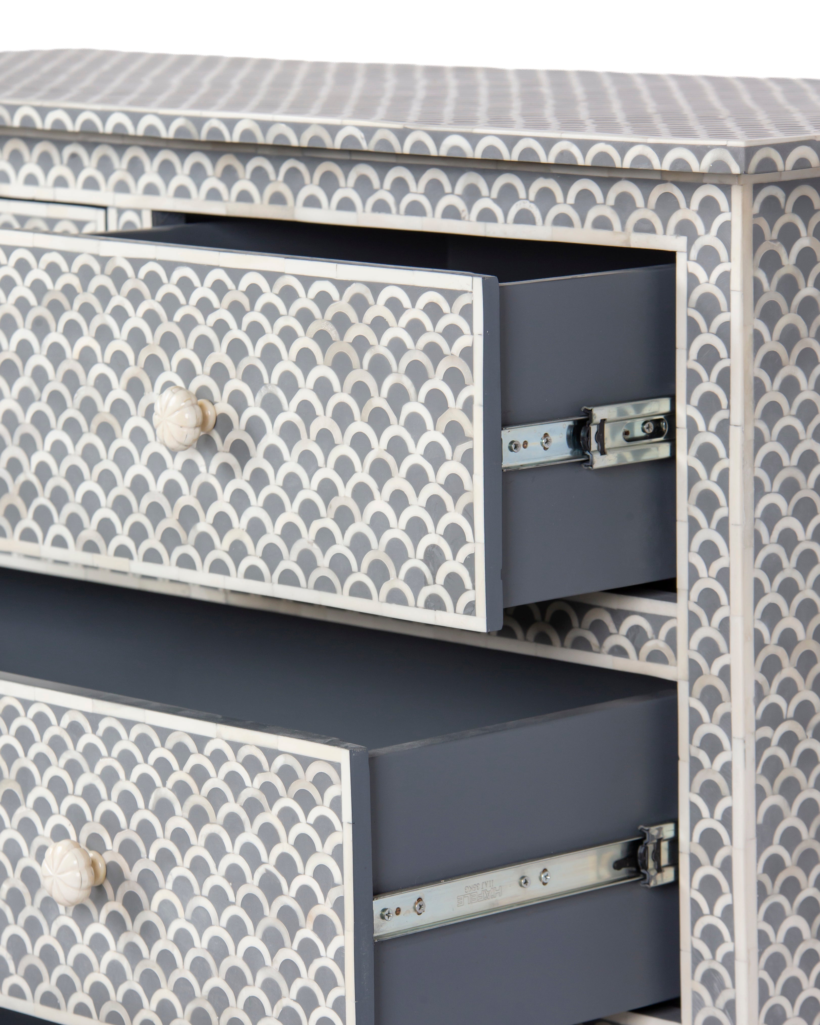 Open drawers and side inlay panel of Basel tall grey chest
