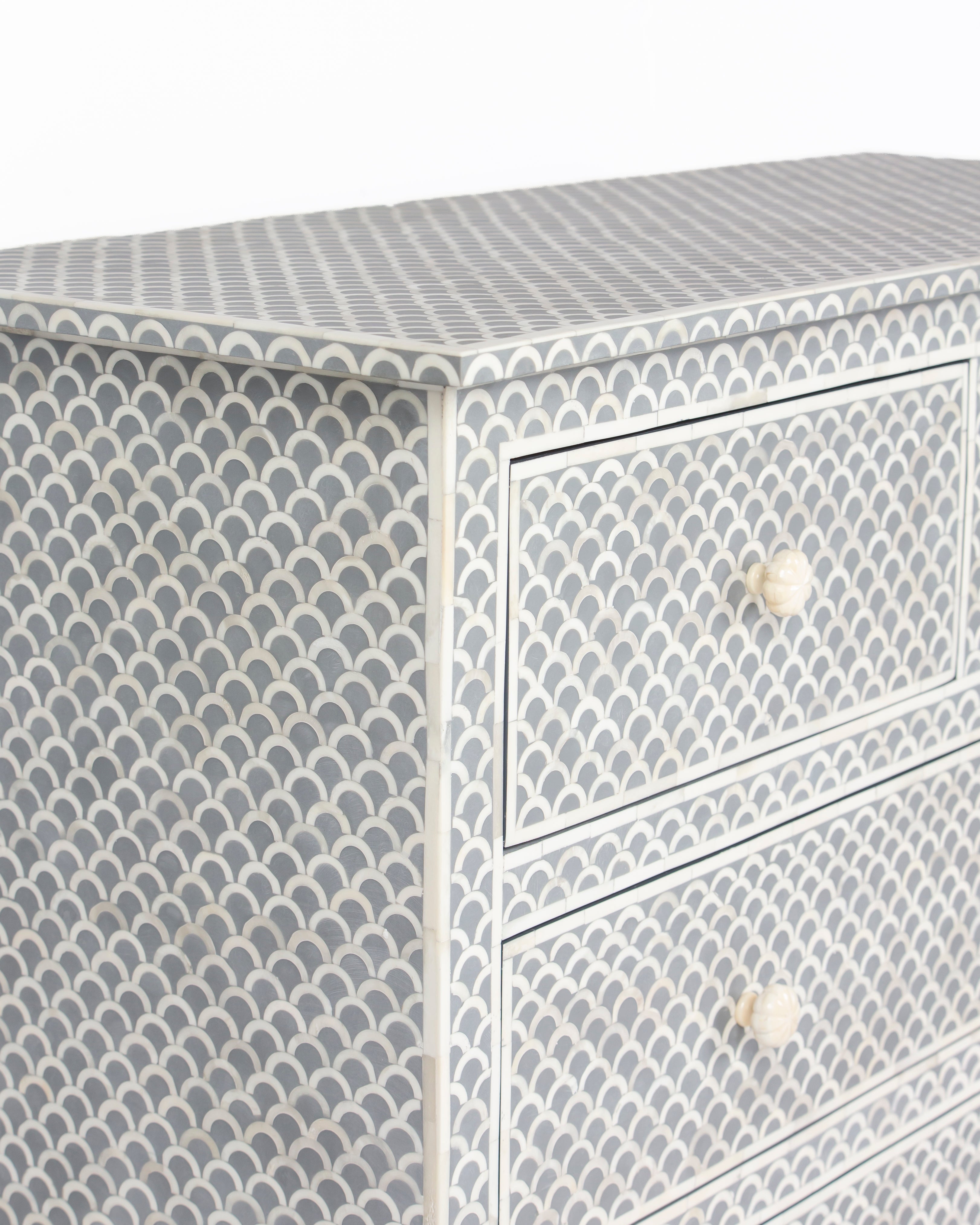 Top surface and drawer fronts of Basel grey fish scale chest