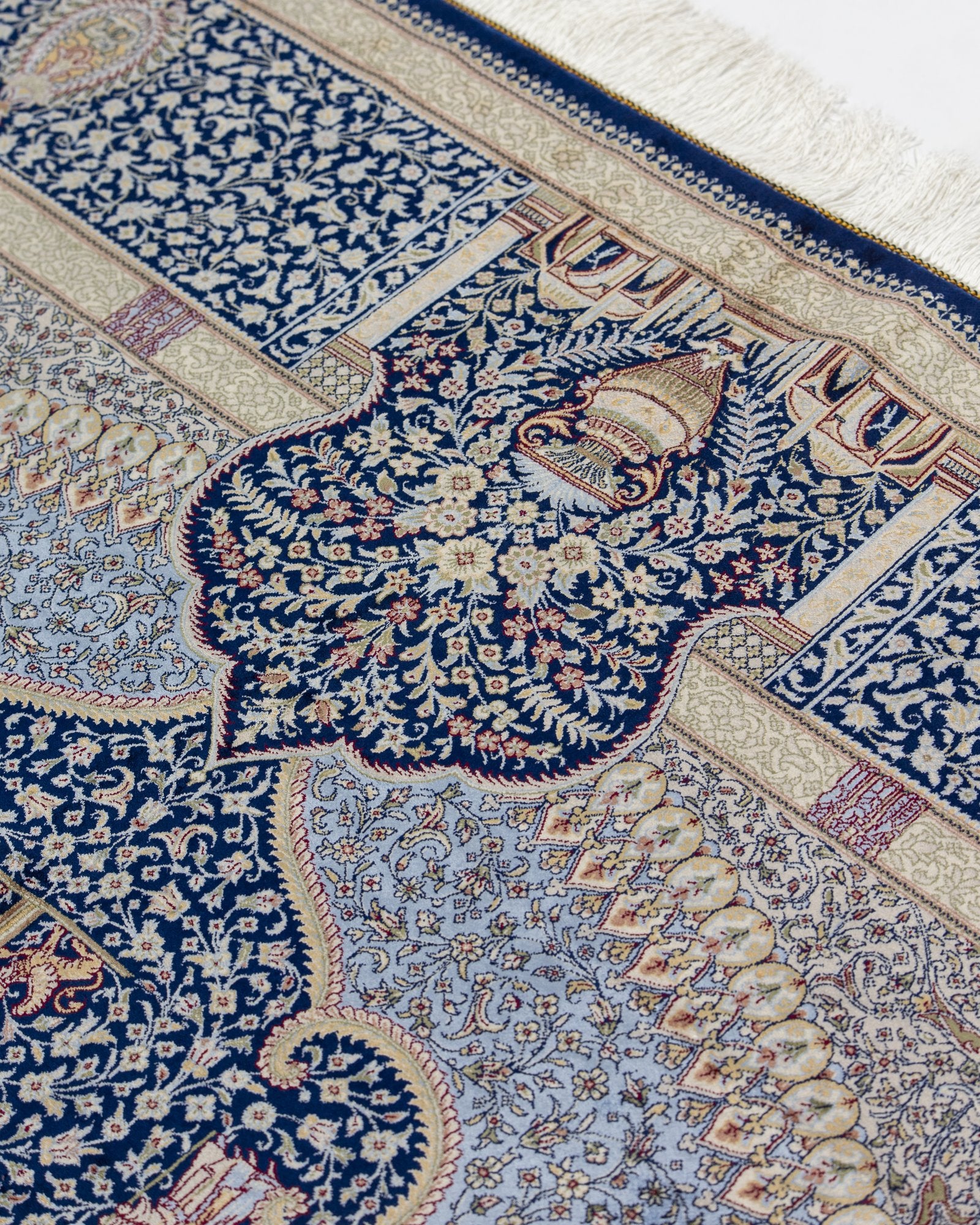 Behnaz silk carpet angled view showing cornflower blue tones, 200 x 300 cm - Tabeer Homes Dubai