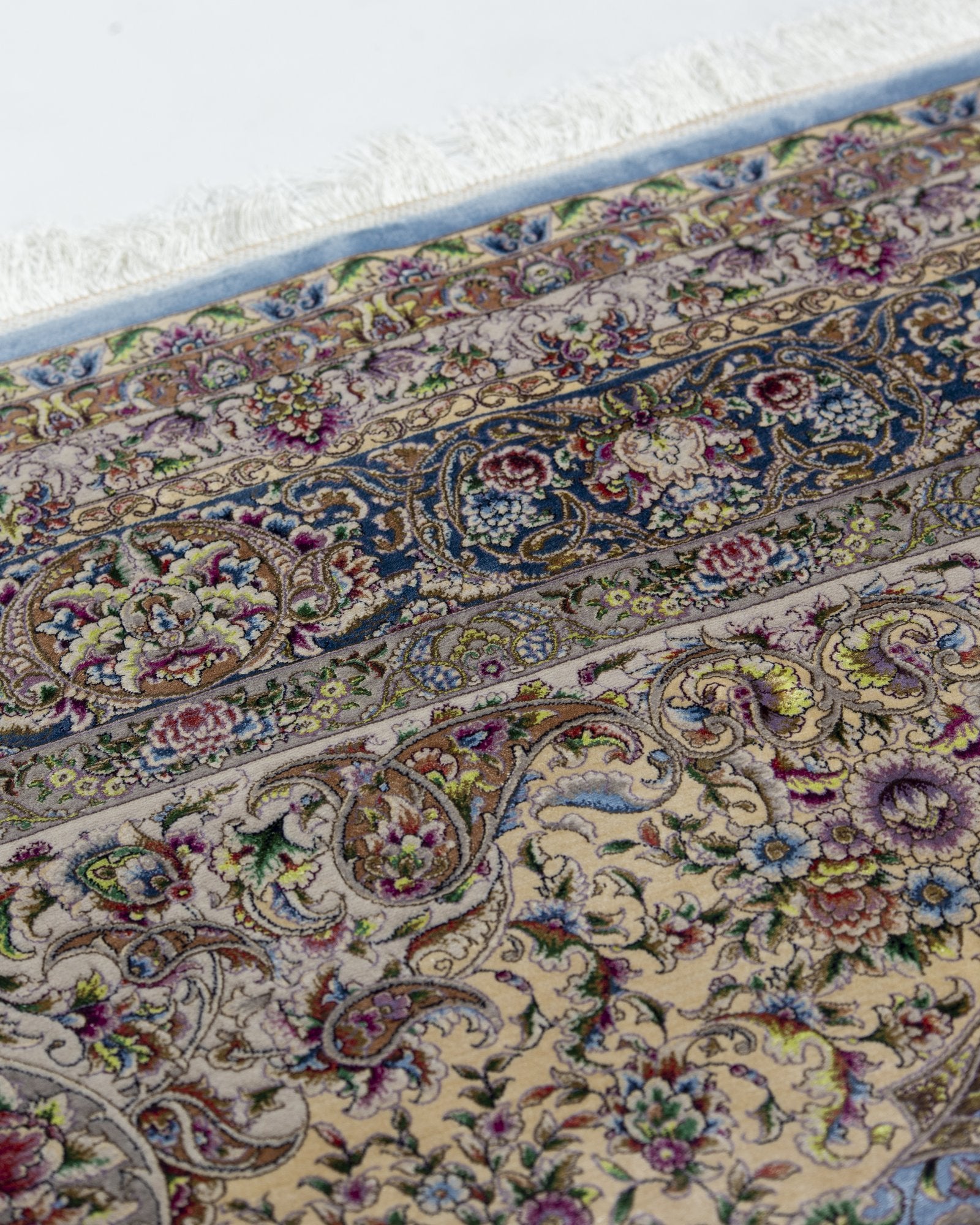 Bianca Persian silk and wool rug folded corner showing fine weave, pearl grey 200 x 300 cm - Tabeer Homes Dubai