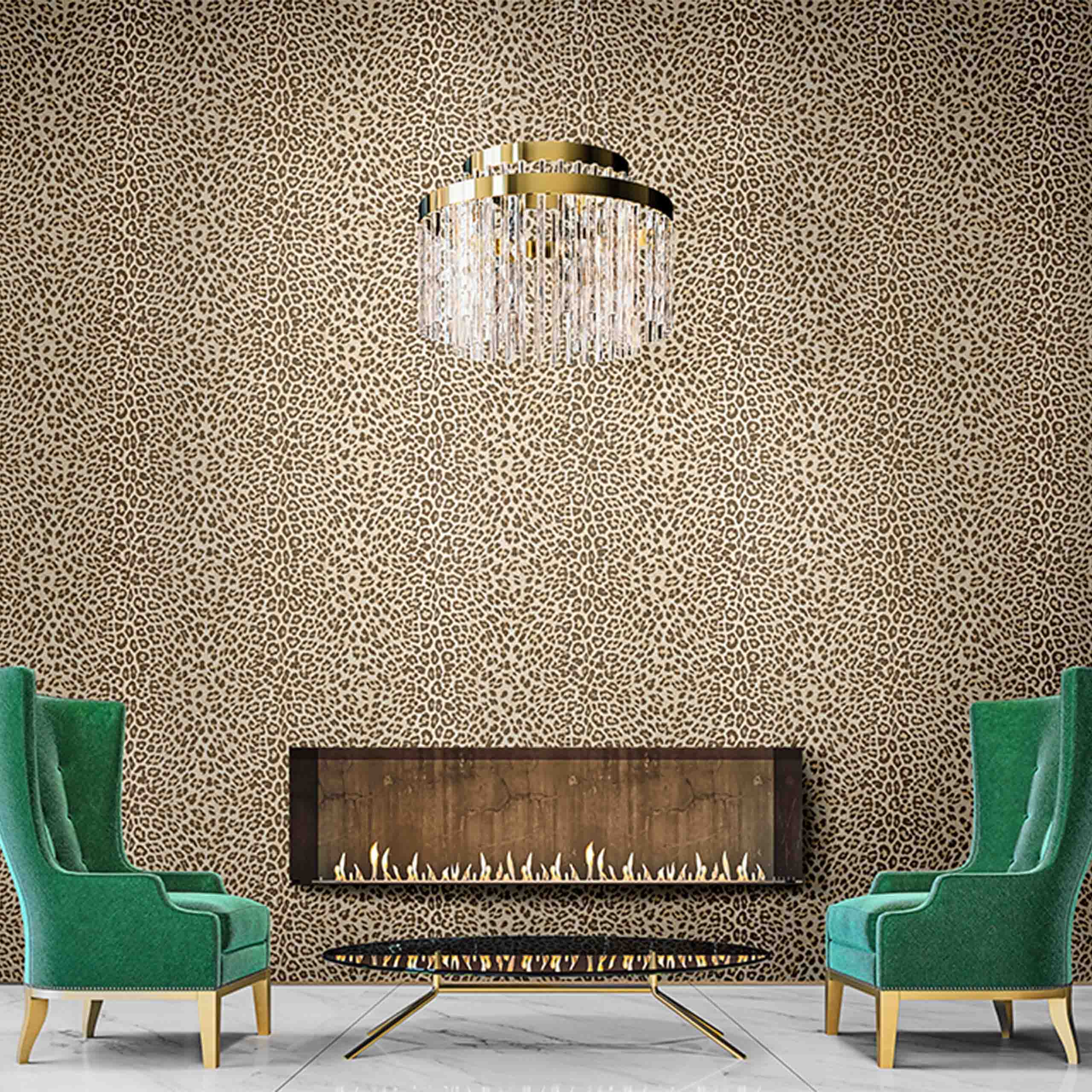 A luxurious room featuring cheetah-print vinyl wallpaper, paired with green chairs and a gold chandelier.