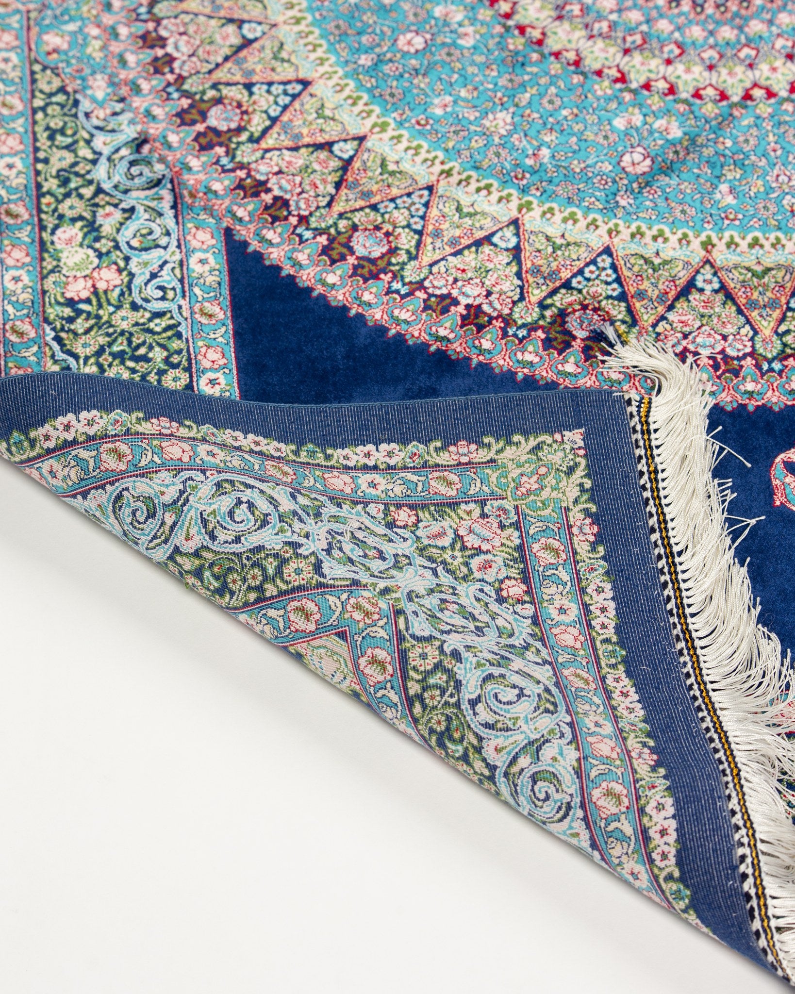 Angled view of the Darya silk rug field