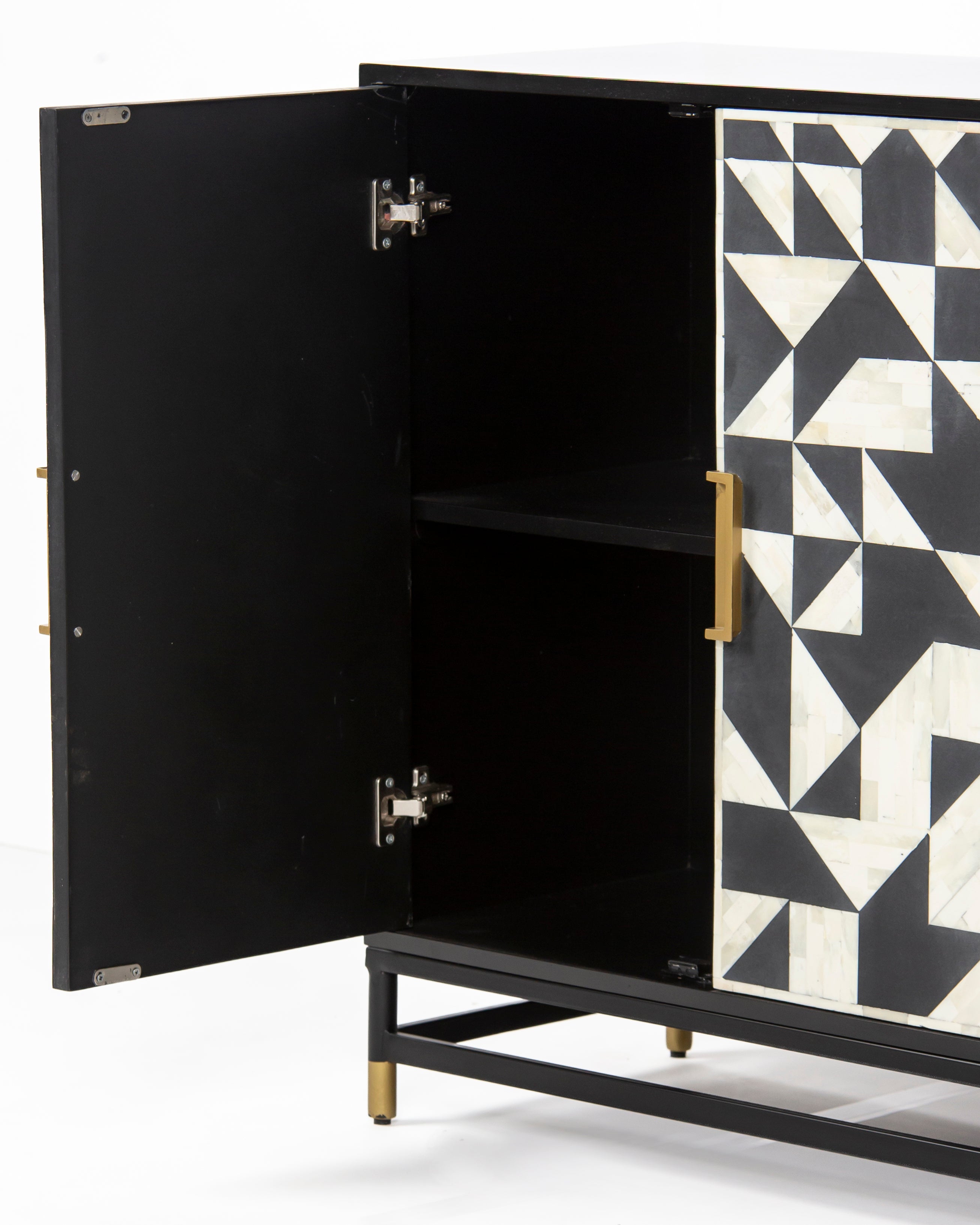 Interior shelf and hinge detail of Eve black sideboard
