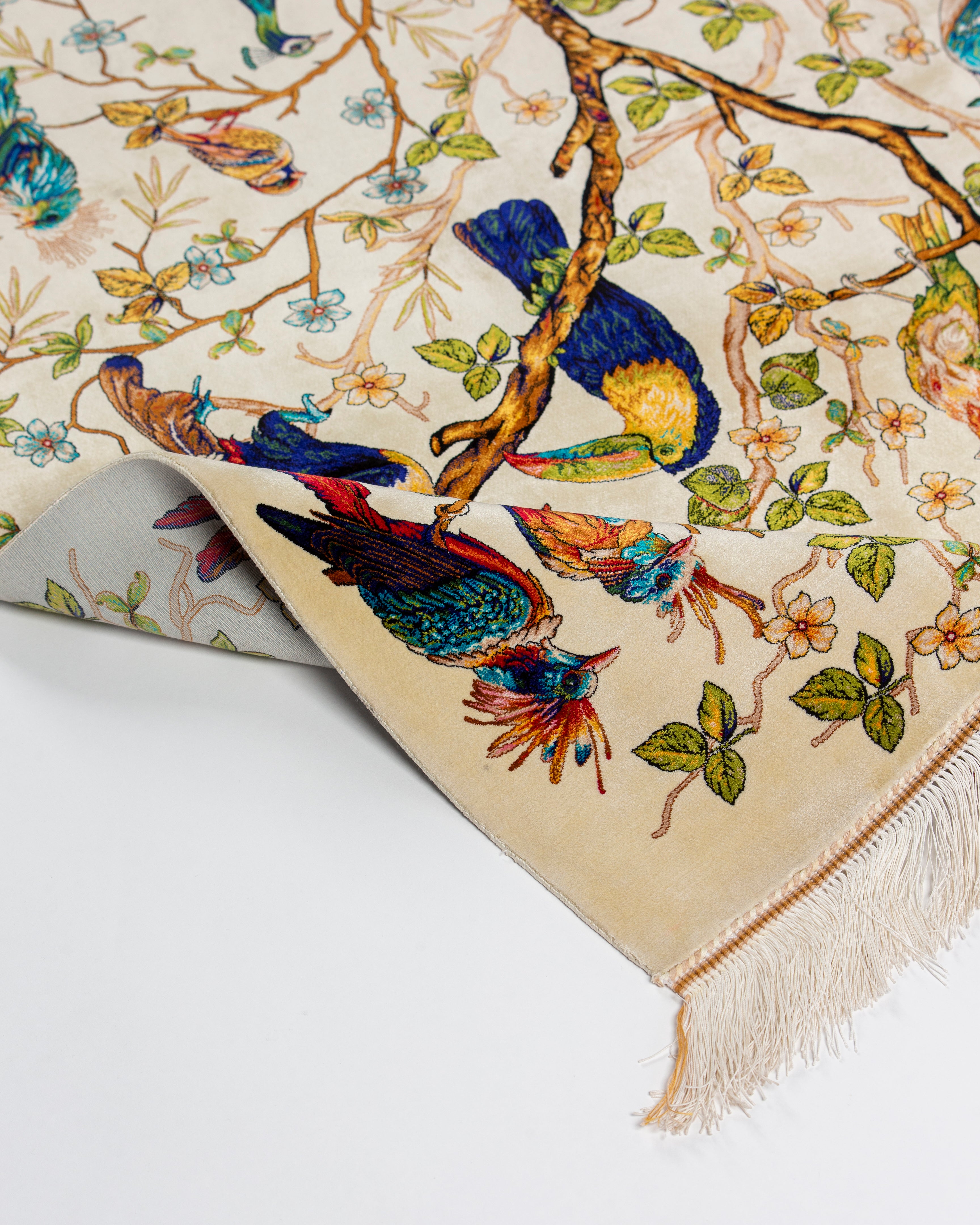 Silk pile detail of the Firdaus tree of life rug