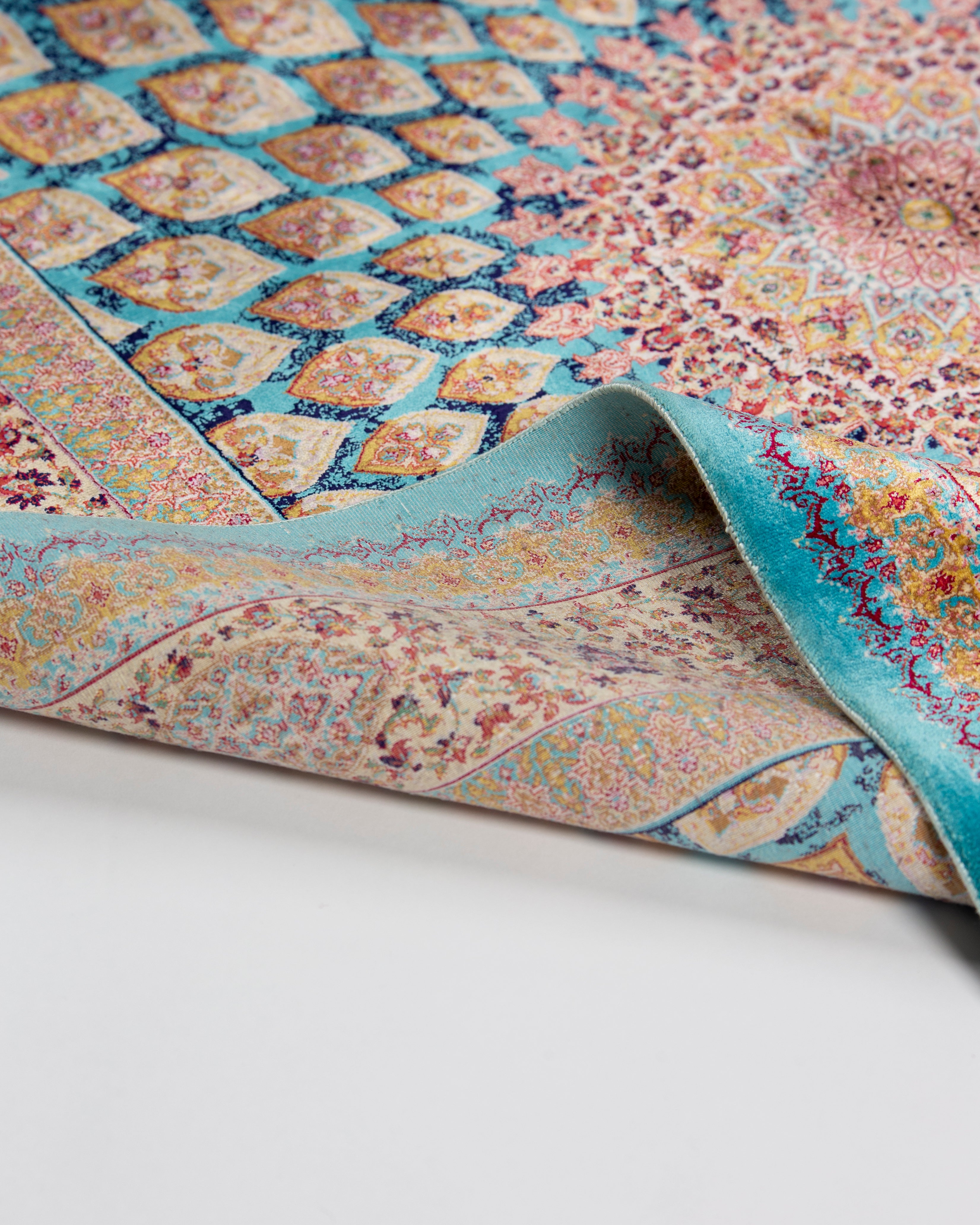 Corner and fringe of the Firuzeh turquoise silk rug