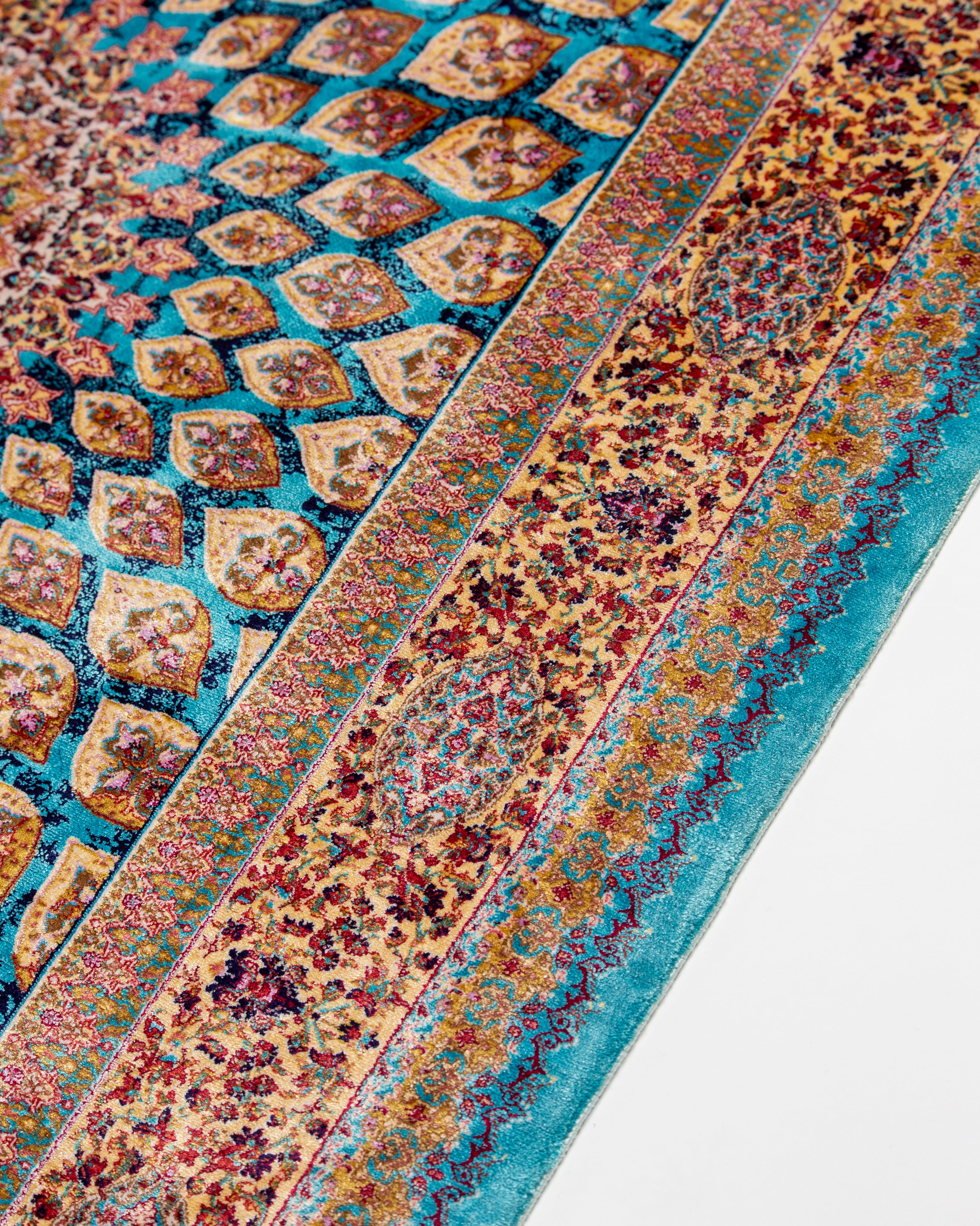 Field pattern detail of the Firuzeh turquoise silk rug