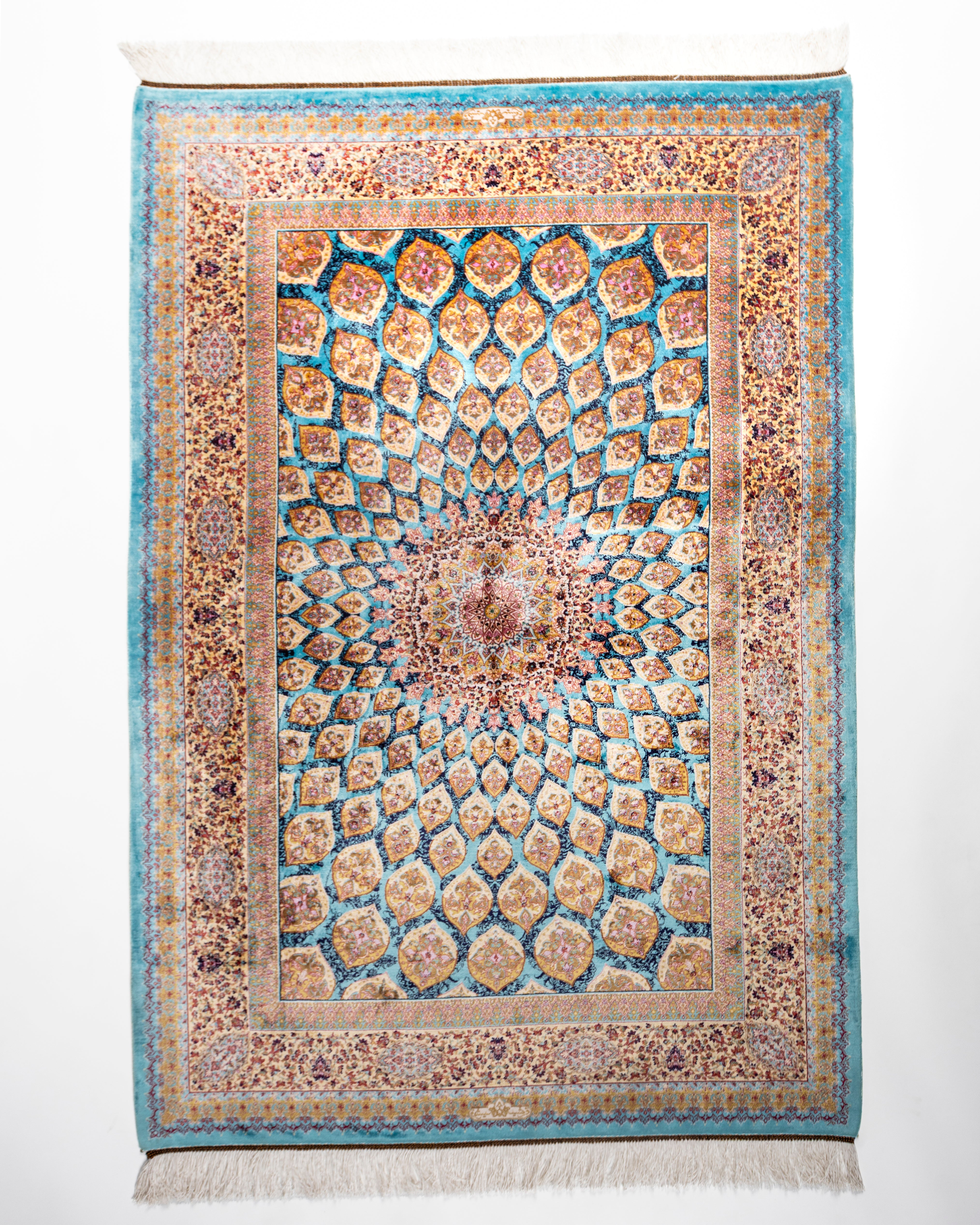 Firuzeh turquoise silk rug with a Persian dome medallion, full view
