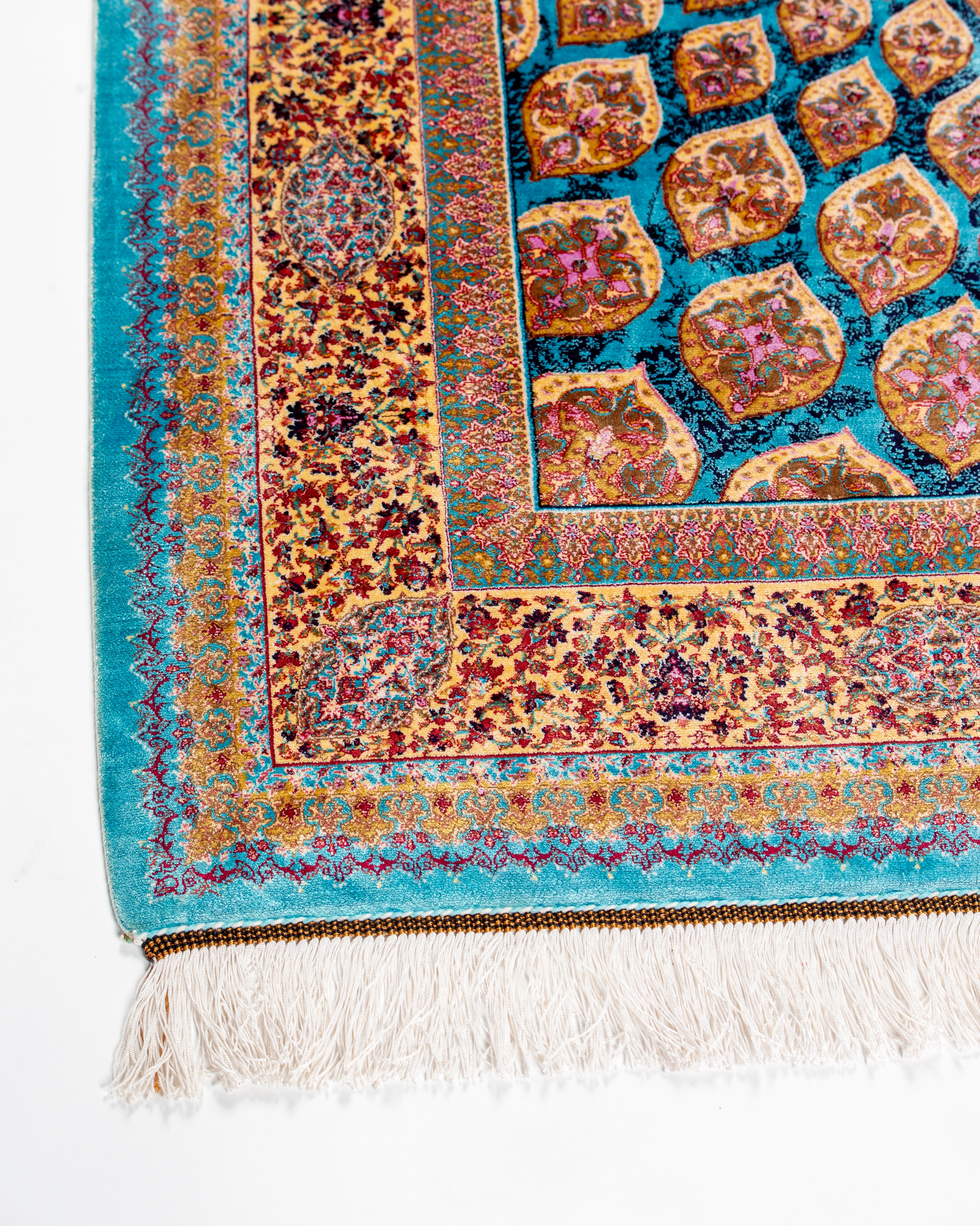 Silk pile detail of the Firuzeh turquoise rug