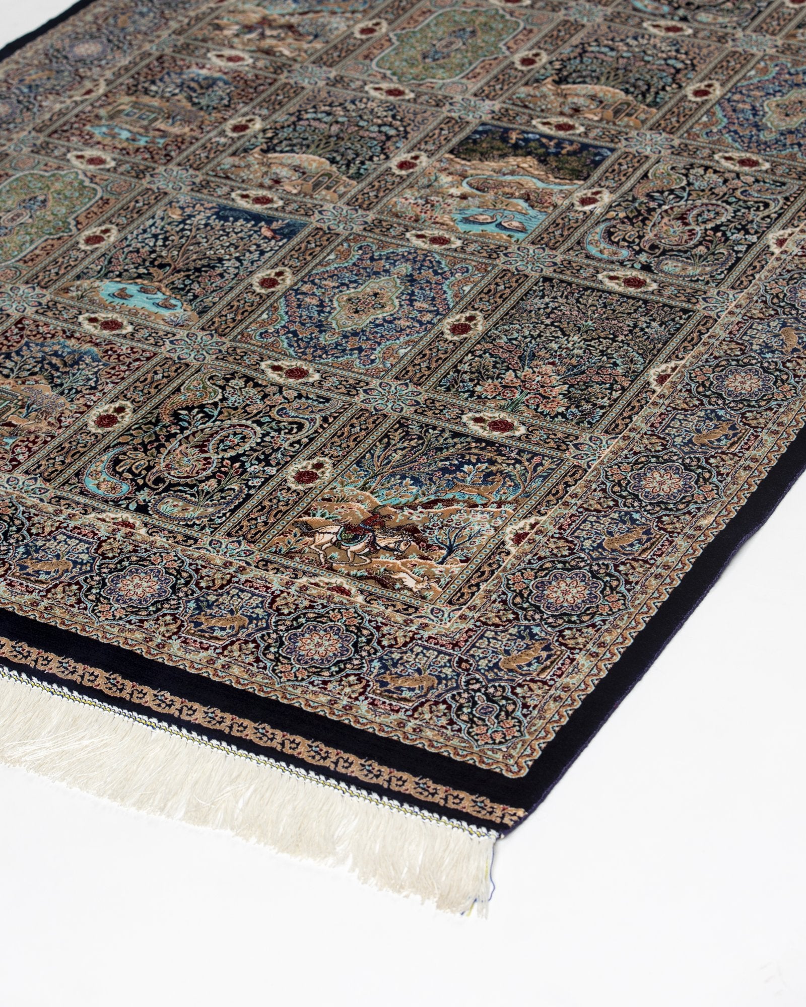 border and field detail on the Golbahar navy silk rug