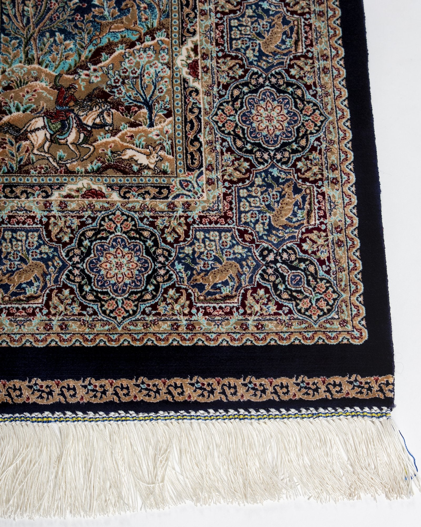 reverse showing the fine silk weave on the Golbahar navy silk rug