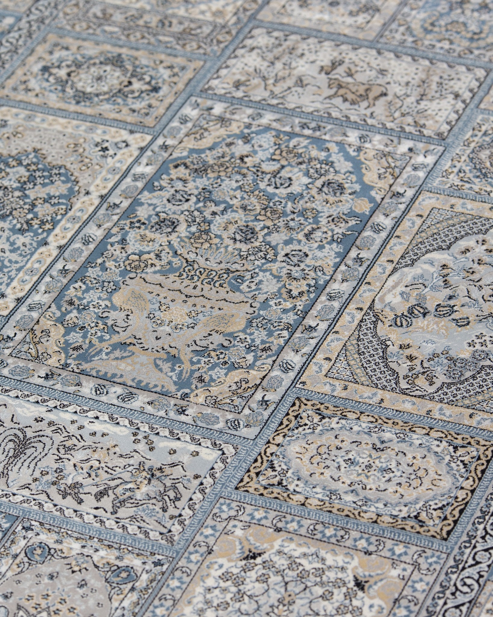 Close panel detail of the Golestan silver grey silk rug